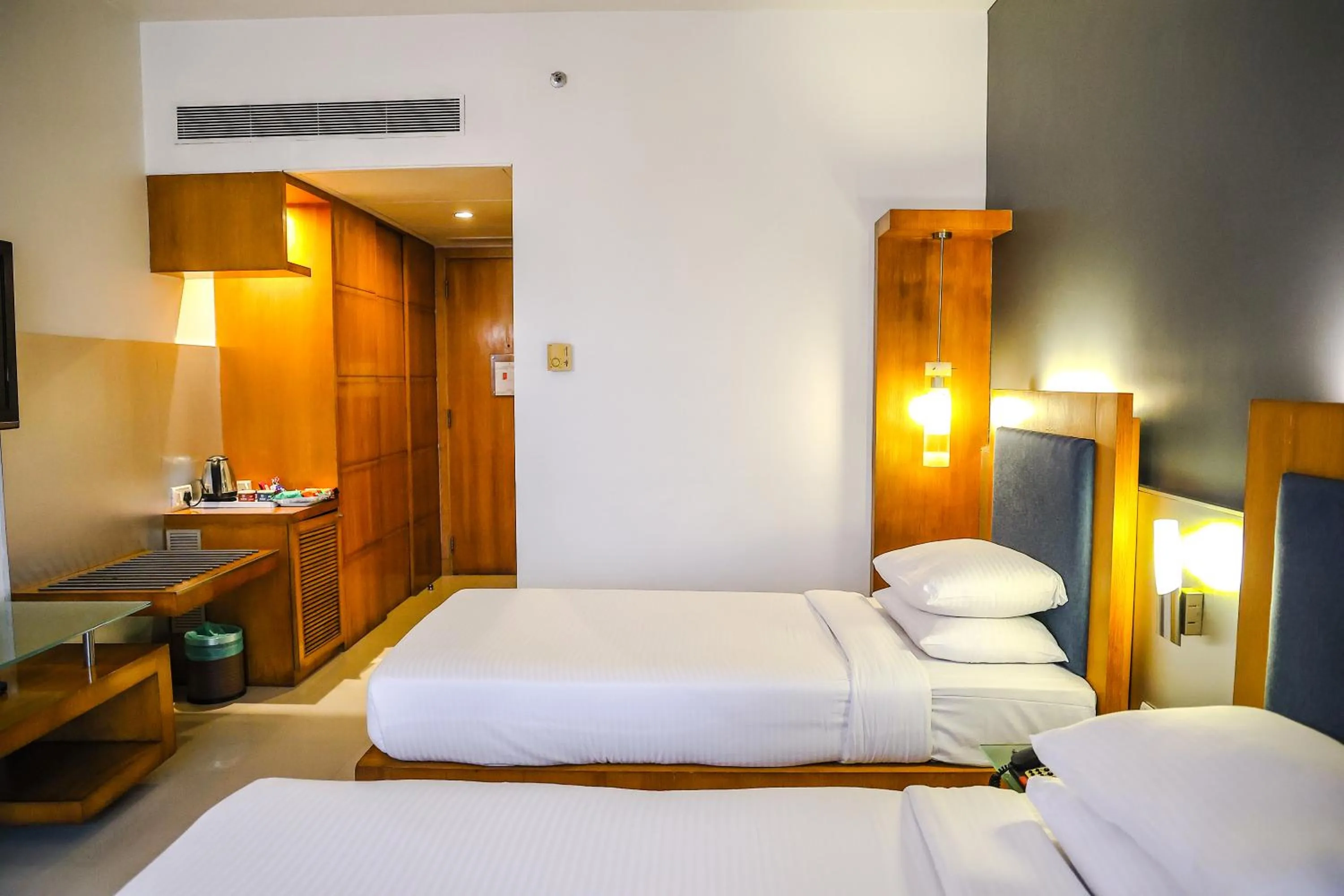 Bed in Krishna Palace Hotel