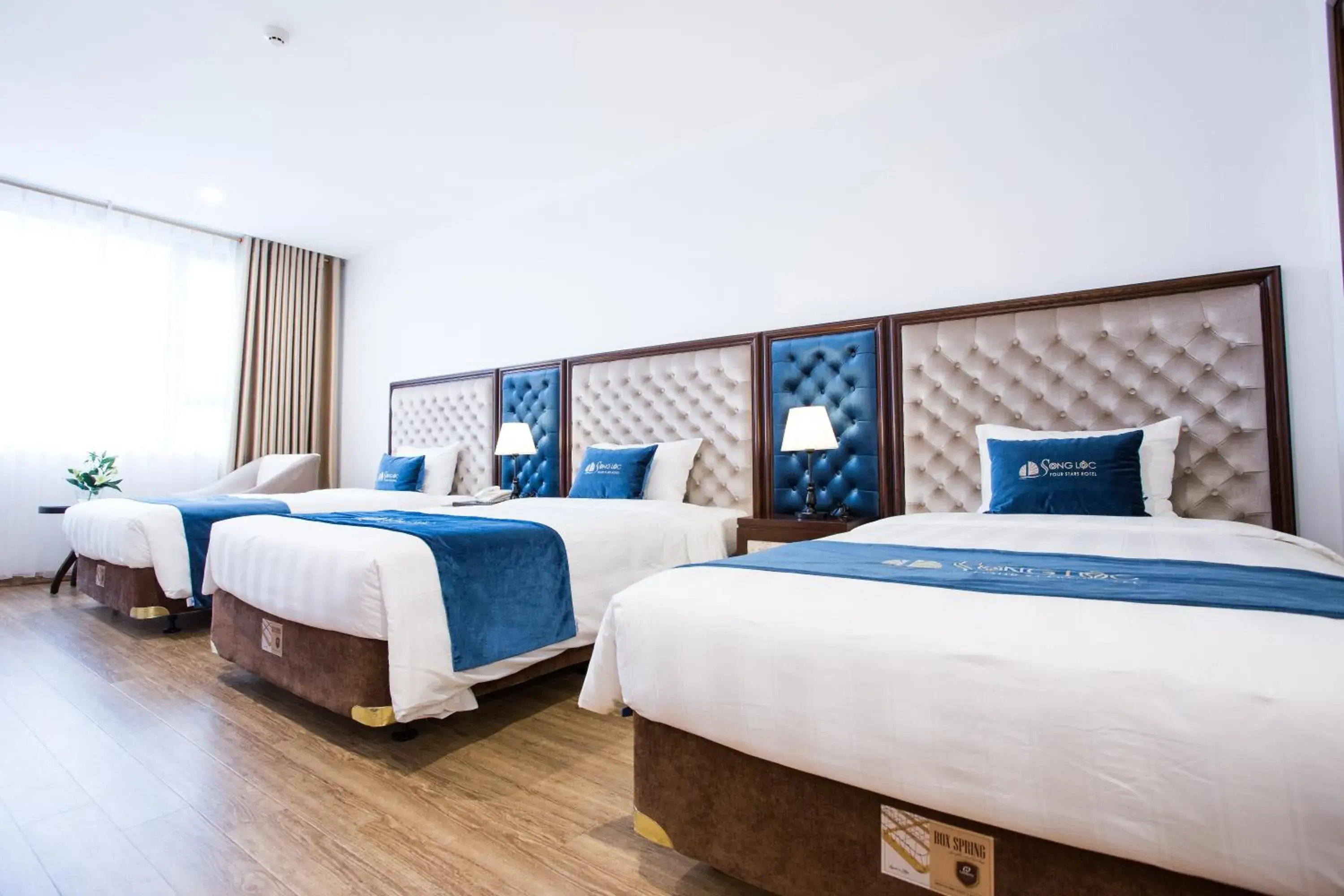 Bed in Song Loc Luxury Hotel Bed in Song Loc Luxury Hotel