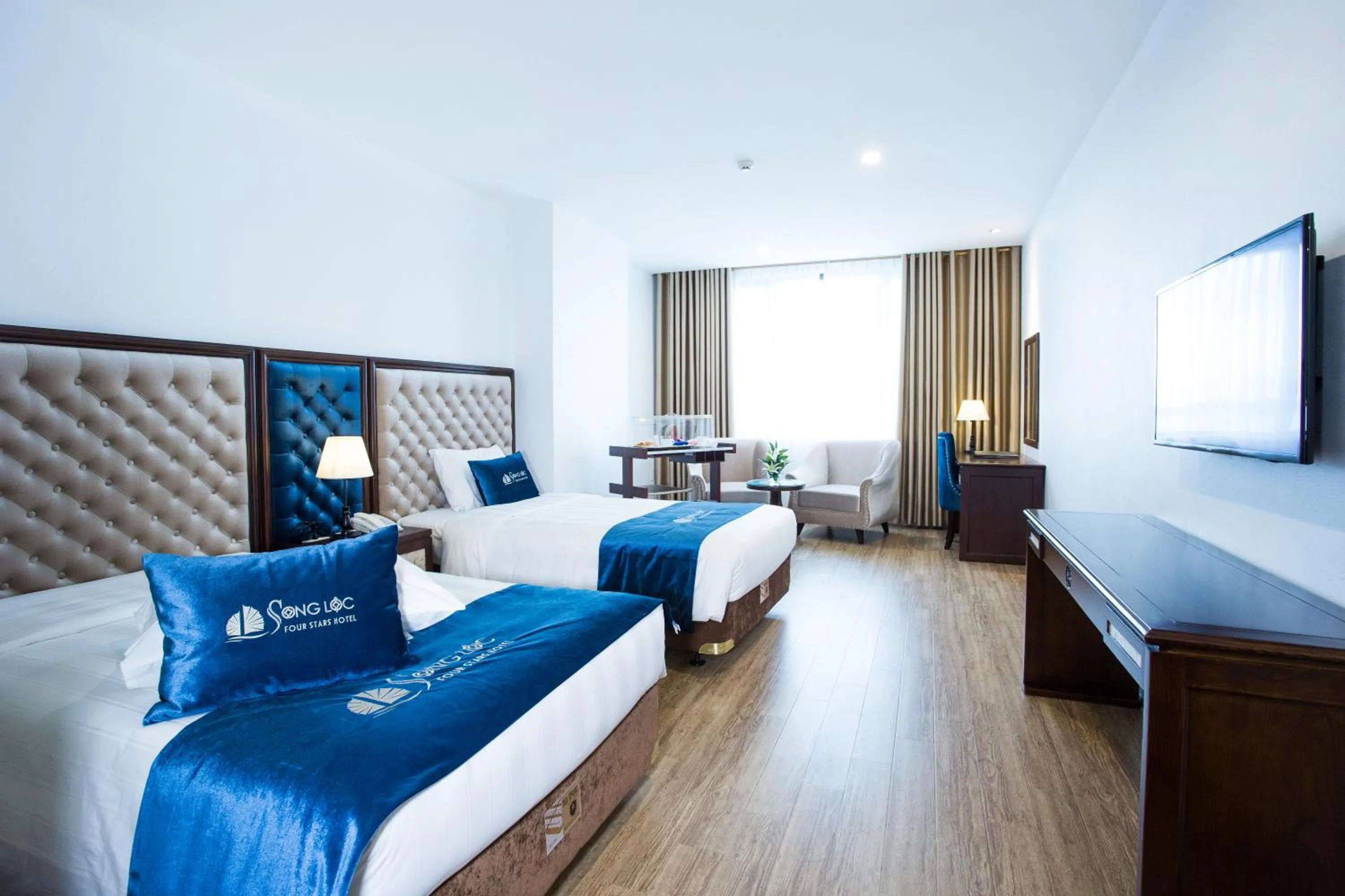 Bedroom in Song Loc Luxury Hotel