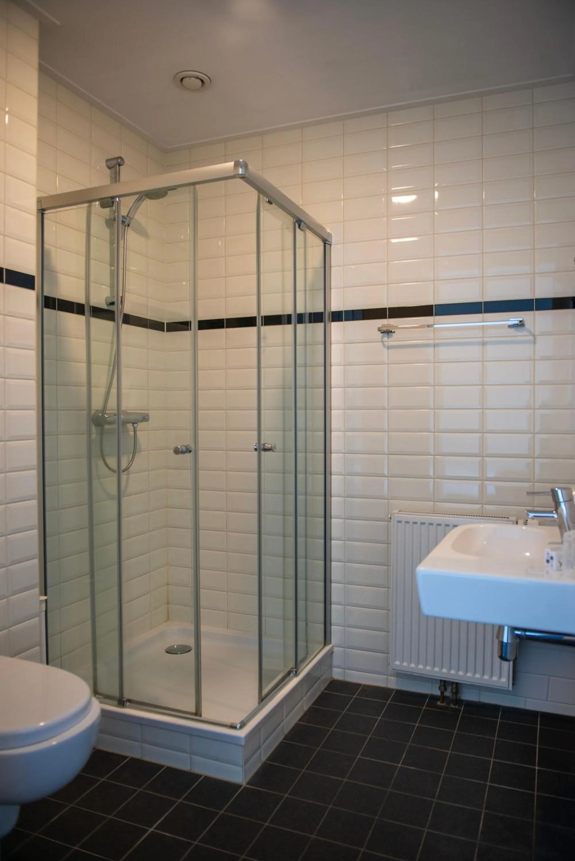 Shower in Hotel de Harmonie