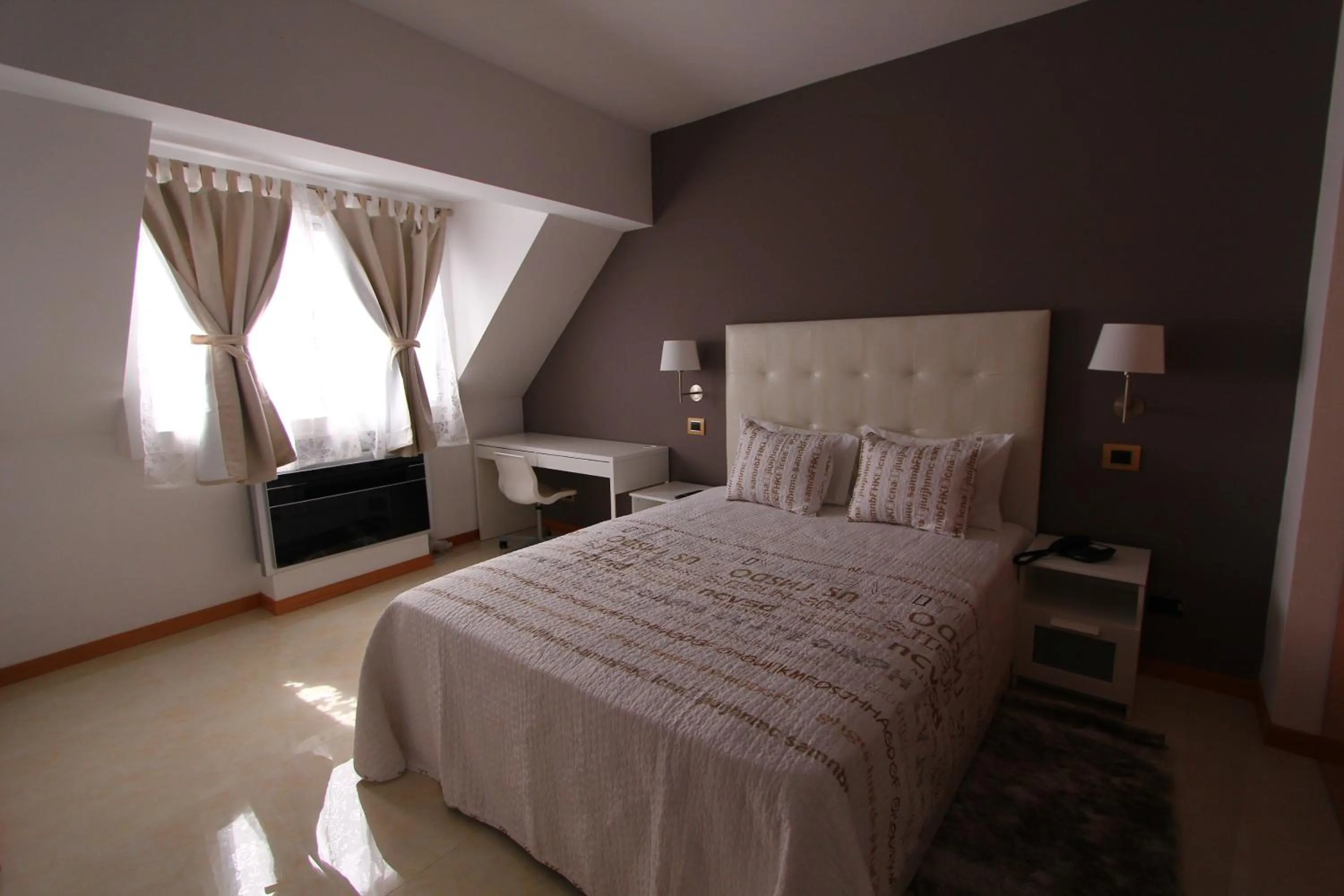 Bedroom in Morenos Boutique Hotel