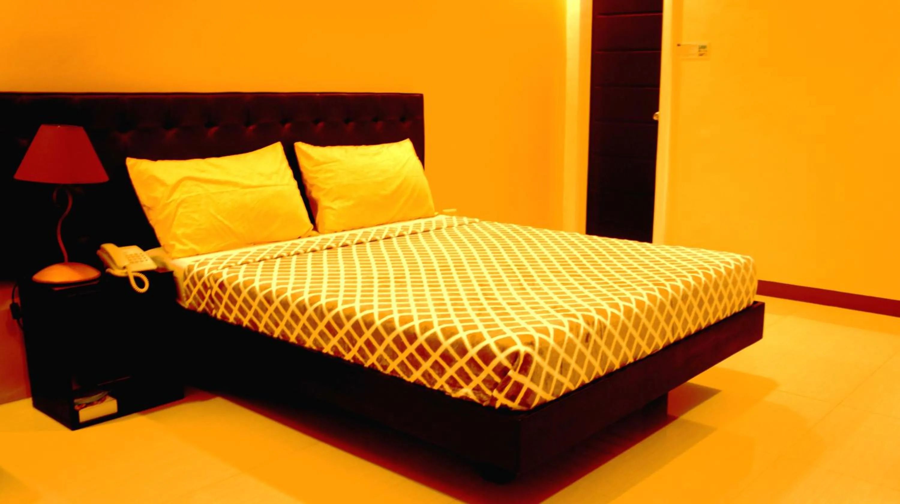 Bed in Urbantel Hotel