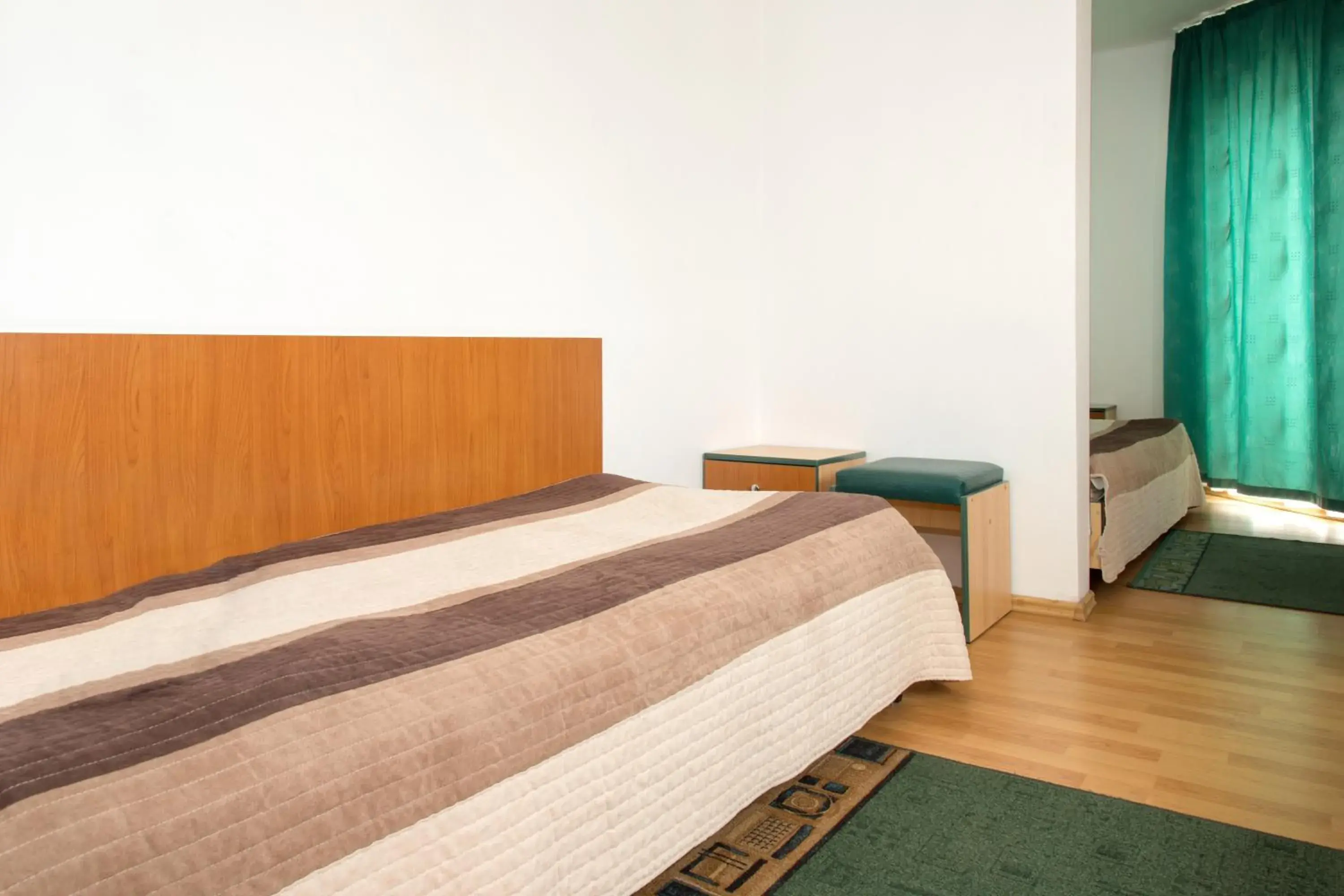 Triple Room in Hotel Beta Triple Room in Hotel Beta