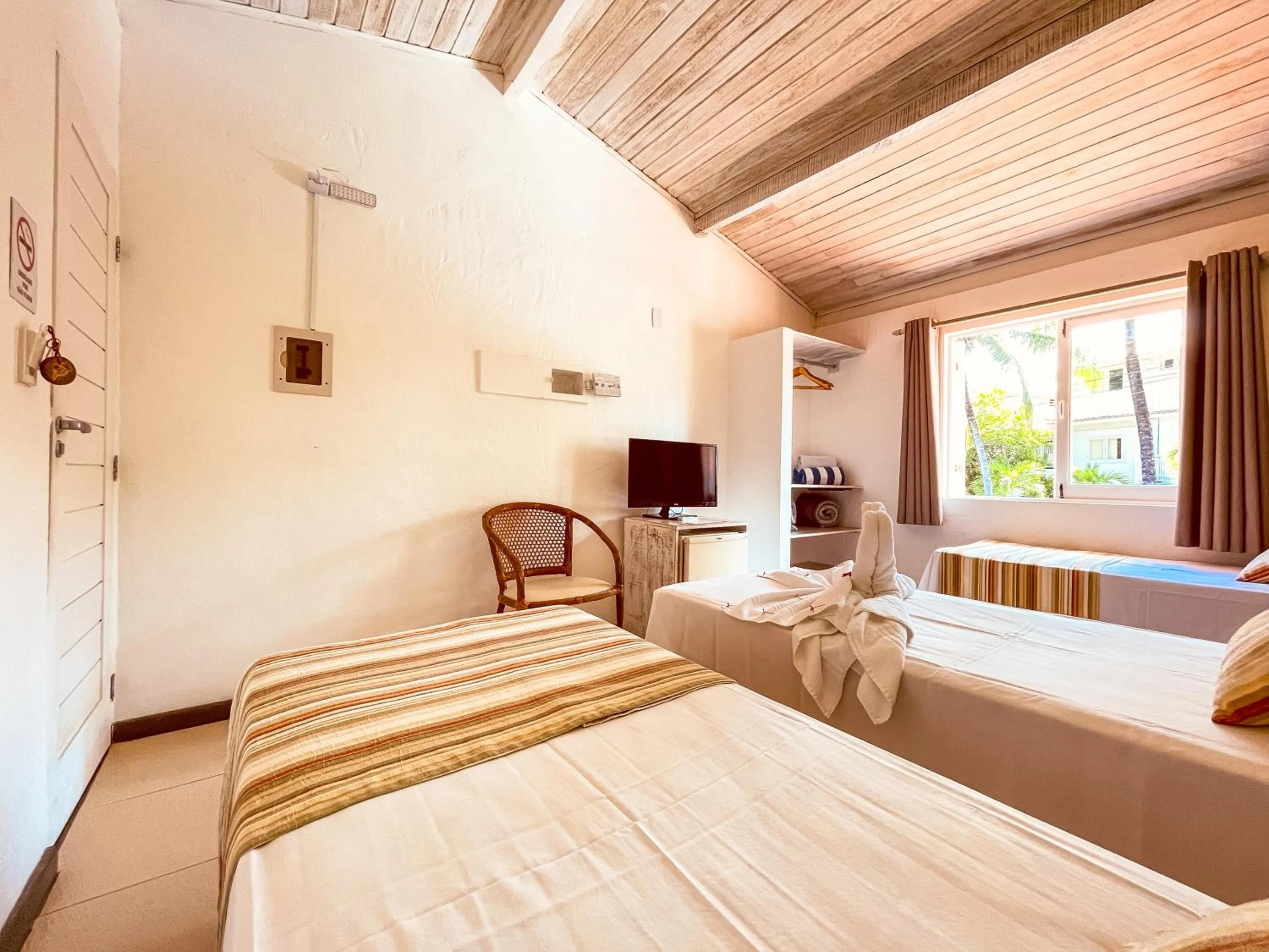 TV and multimedia, Bed in Pousada Tatuapara