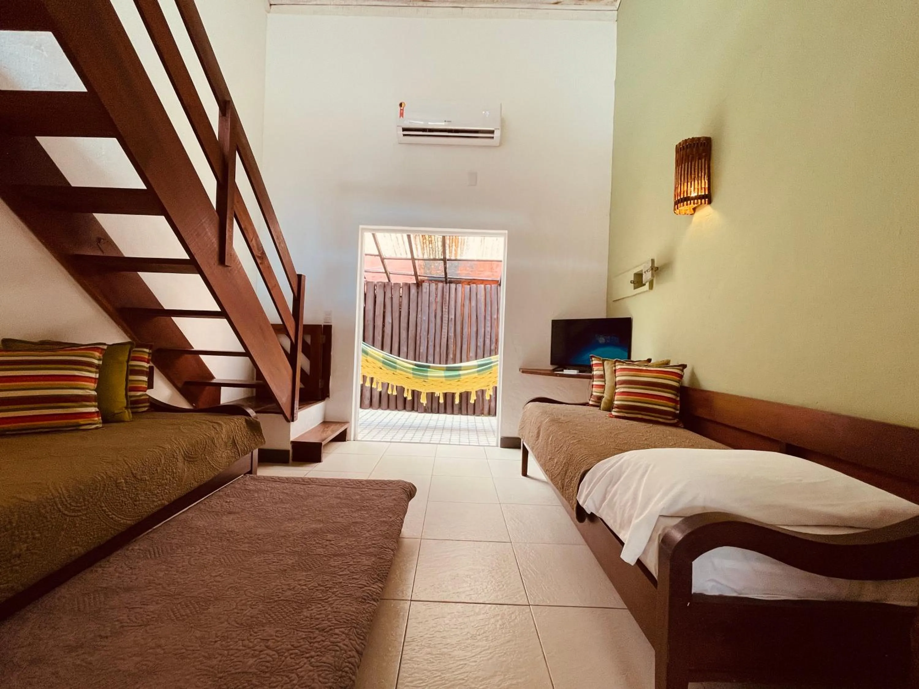 Patio, Bed in Pousada Tatuapara