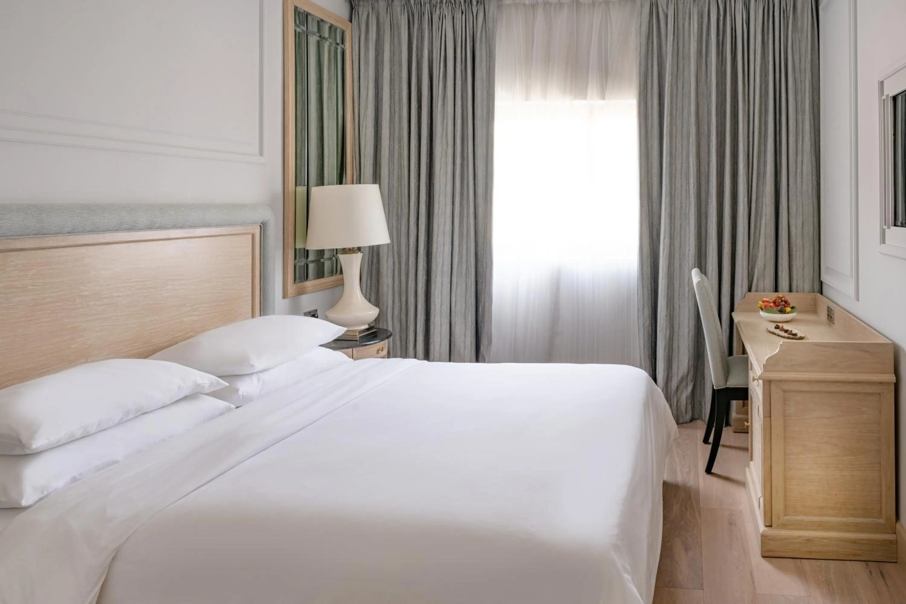 Bed in Palmyard Hotel