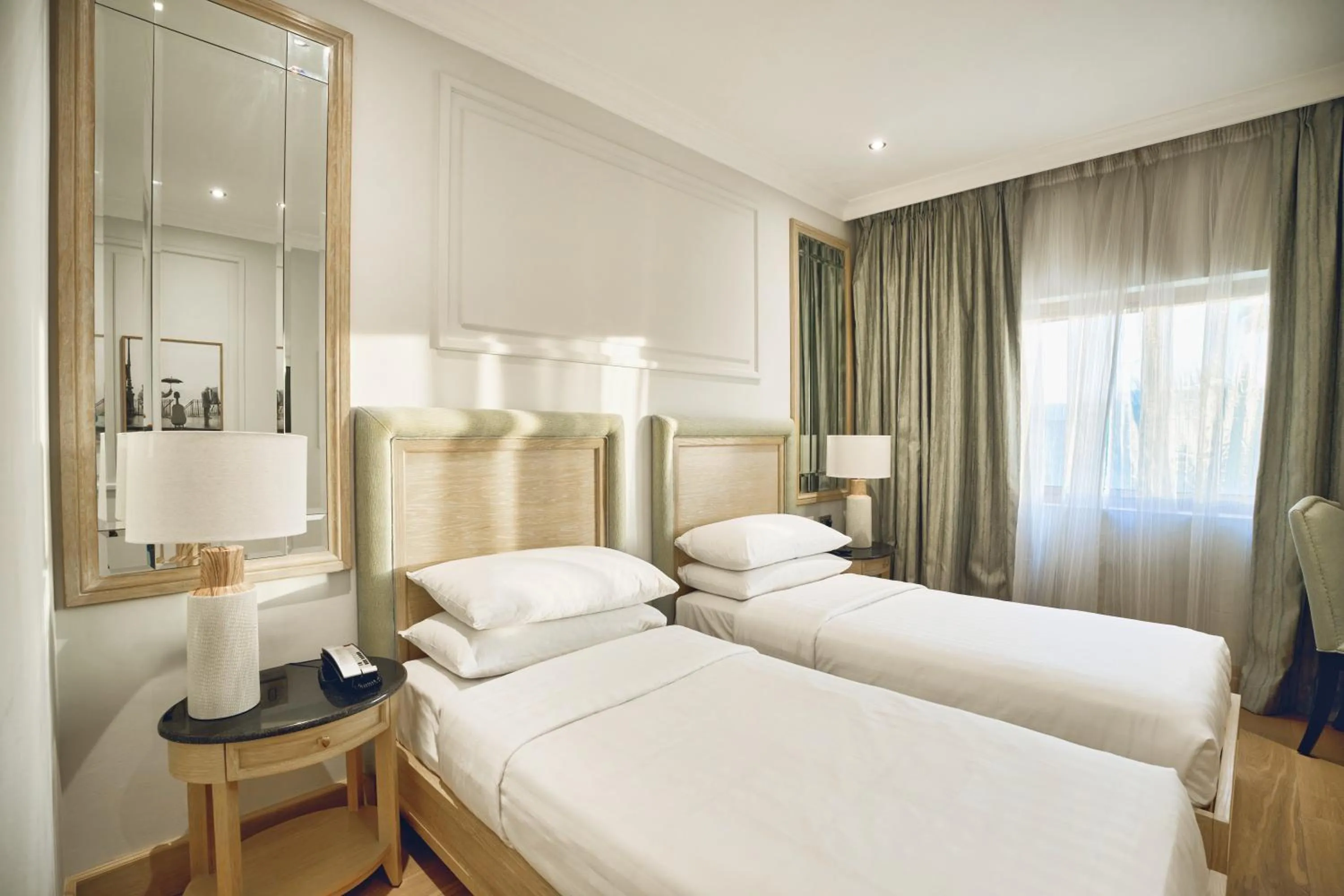 Bed in Palmyard Hotel