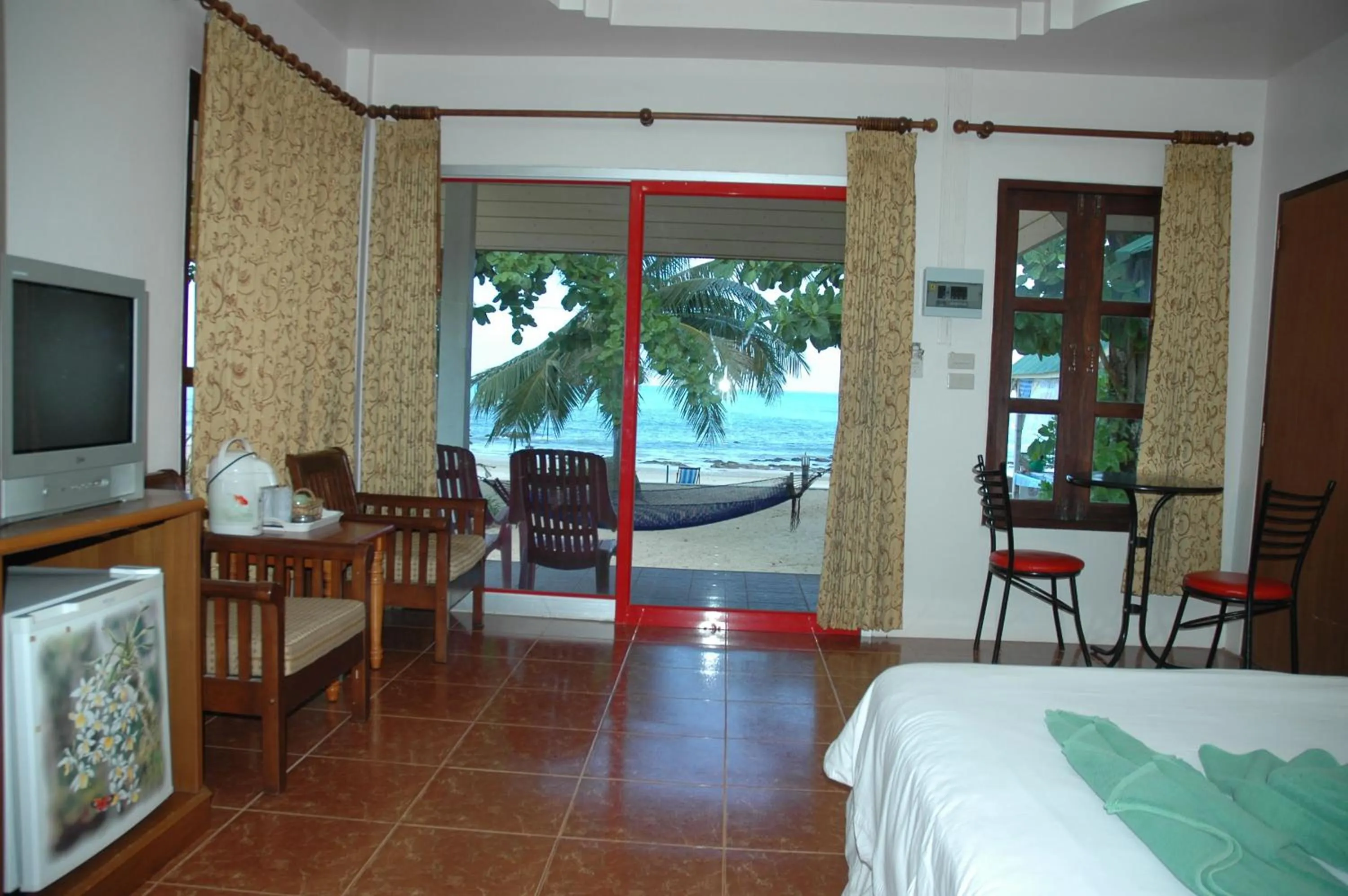 Photo of the whole room, Bed in Ocean View Resort