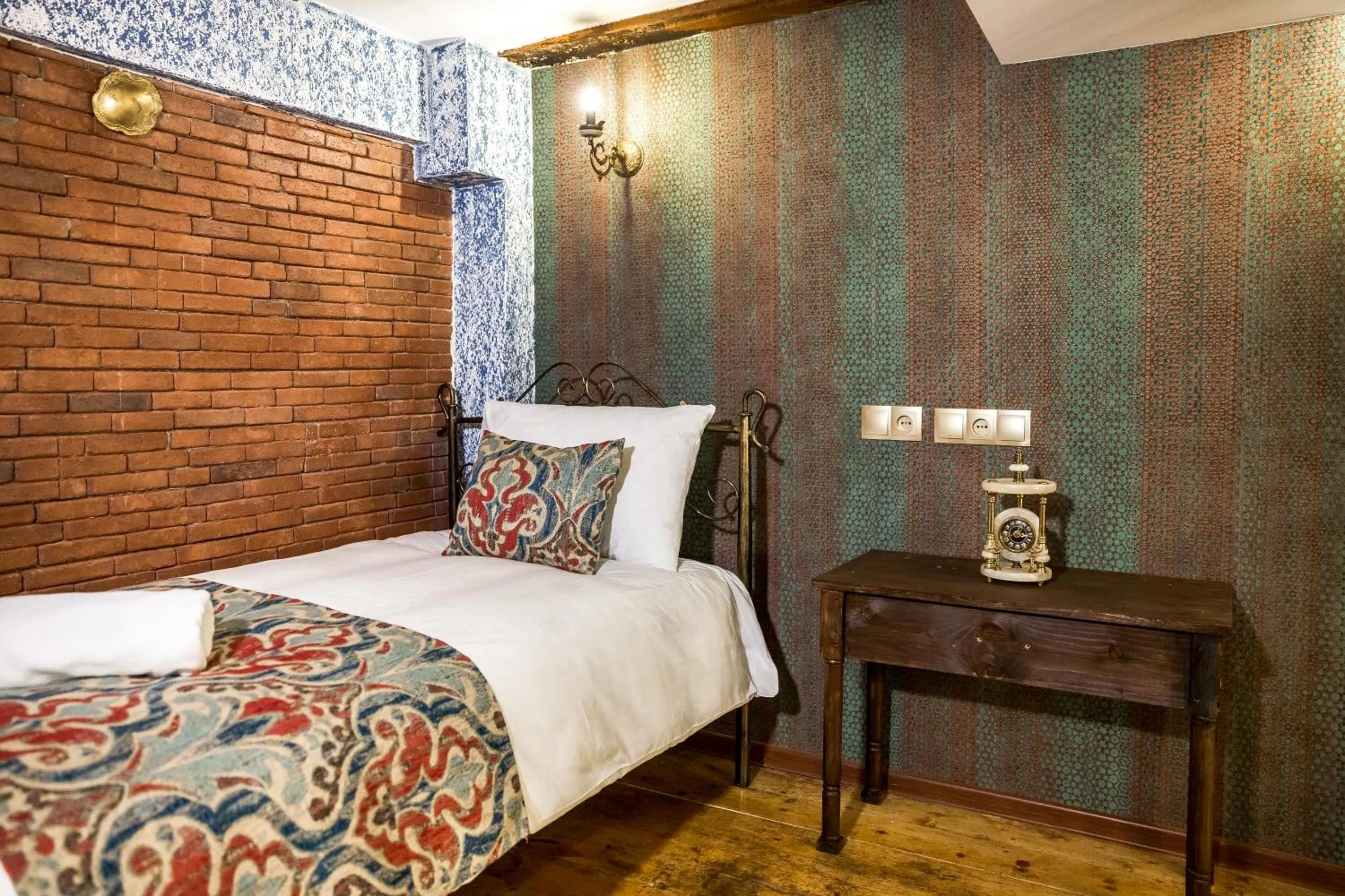 Bed in Tiflis Inn Boutique Hotel