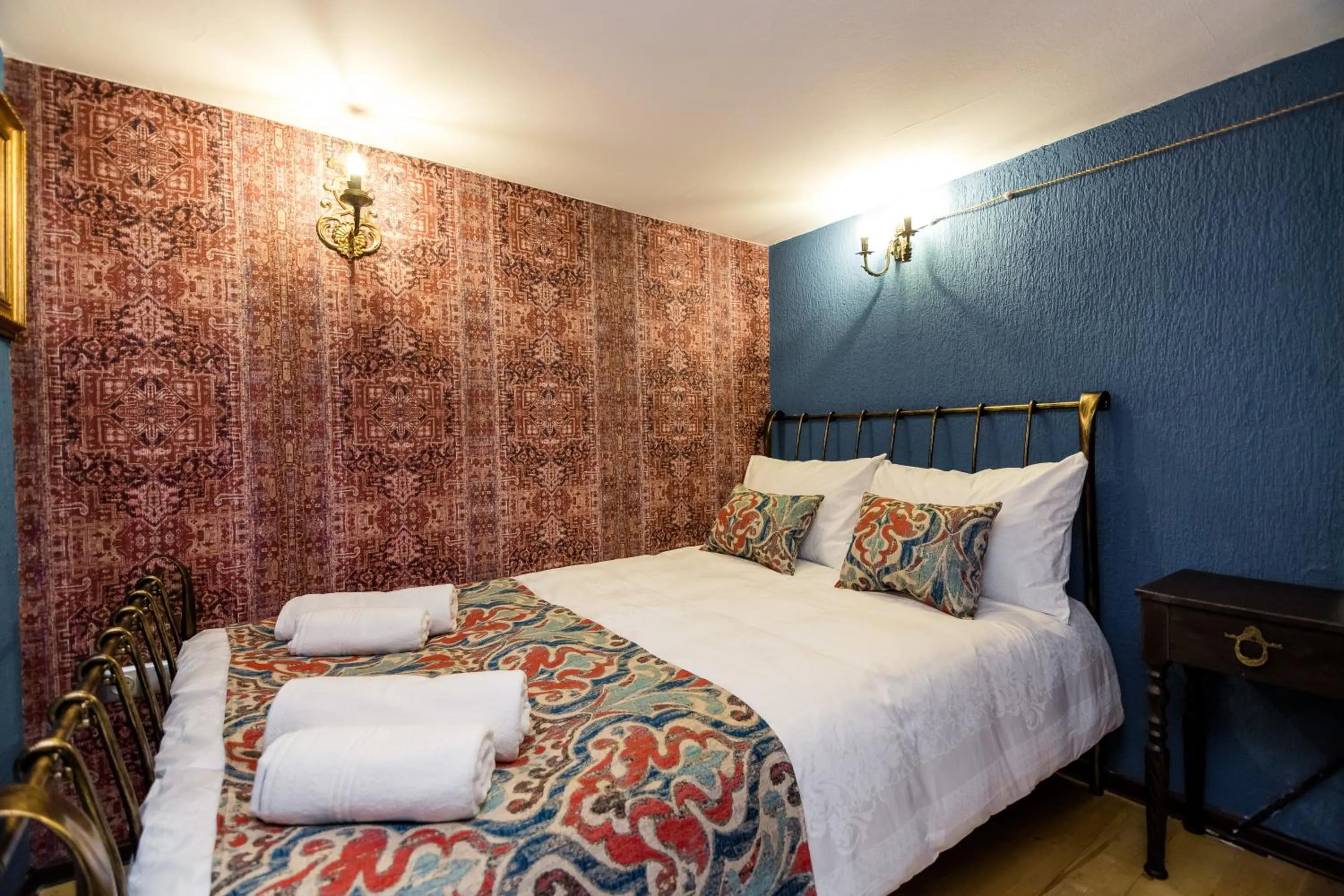 Bed in Tiflis Inn Boutique Hotel