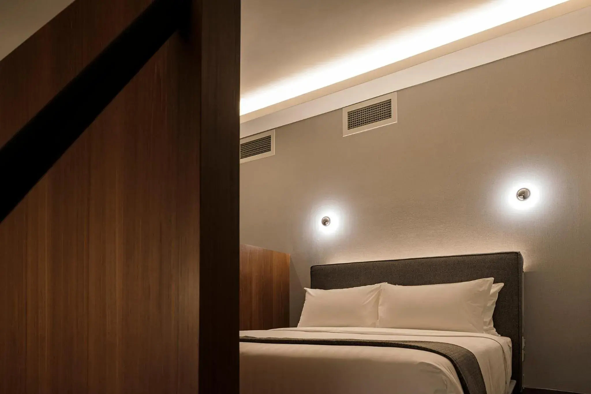 Bed in Wanderlust, The Unlimited Collection managed by The Ascott Limited Bed in Wanderlust, The Unlimited Collection managed by The Ascott Limited