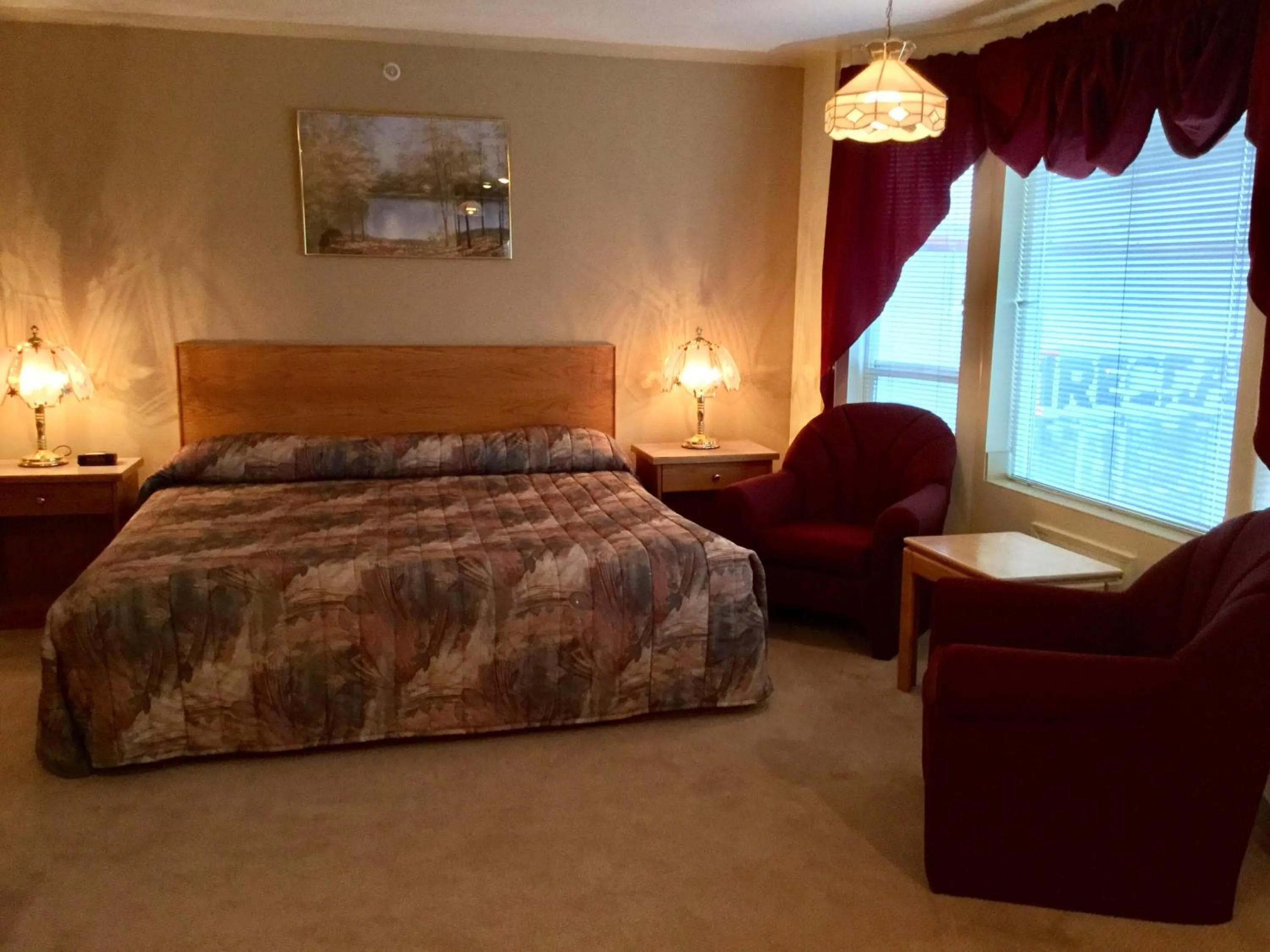 Bed in Western Budget Motel #2 Grande Prairie