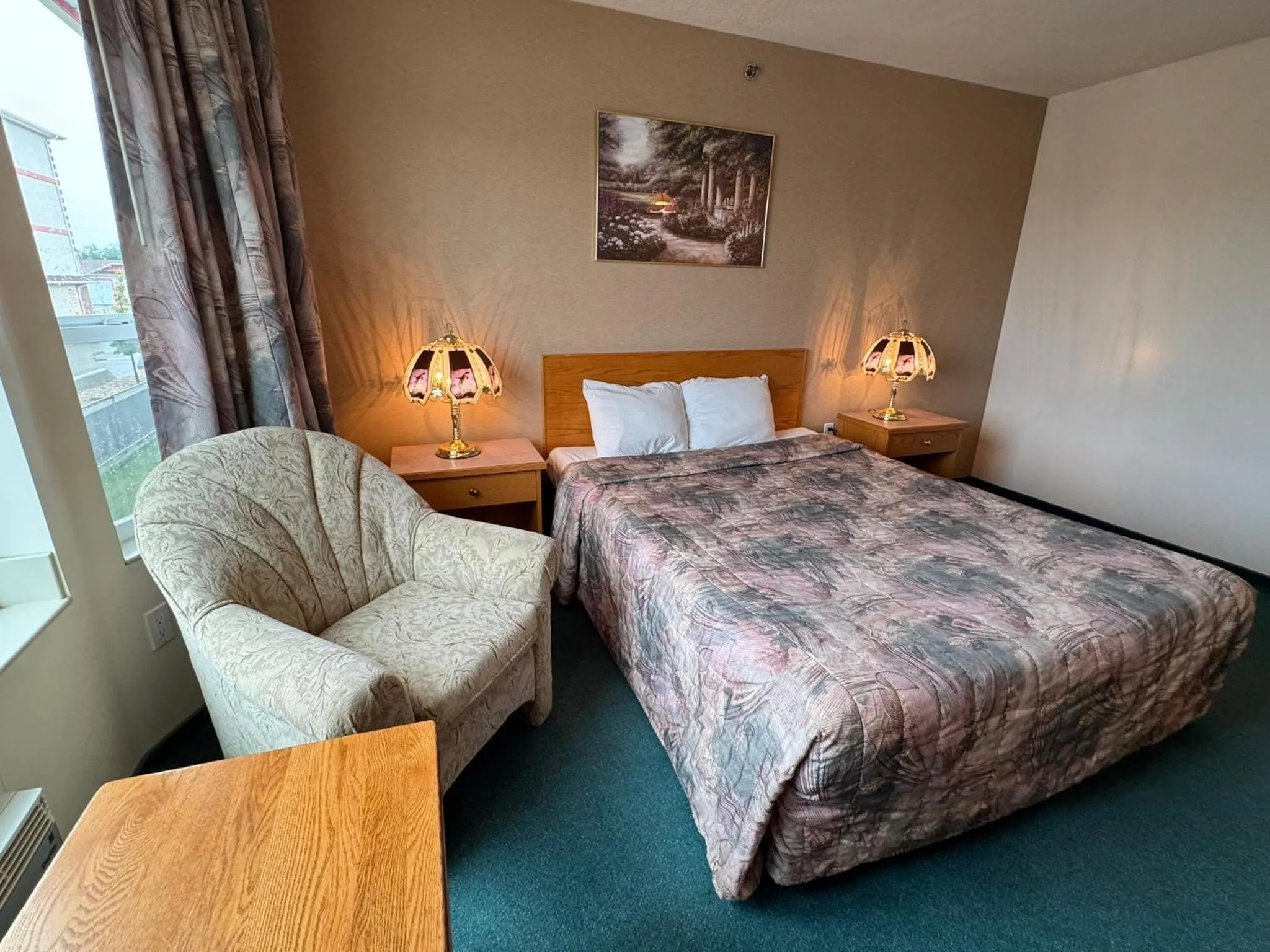 Bed in Western Budget Motel #3 Whitecourt