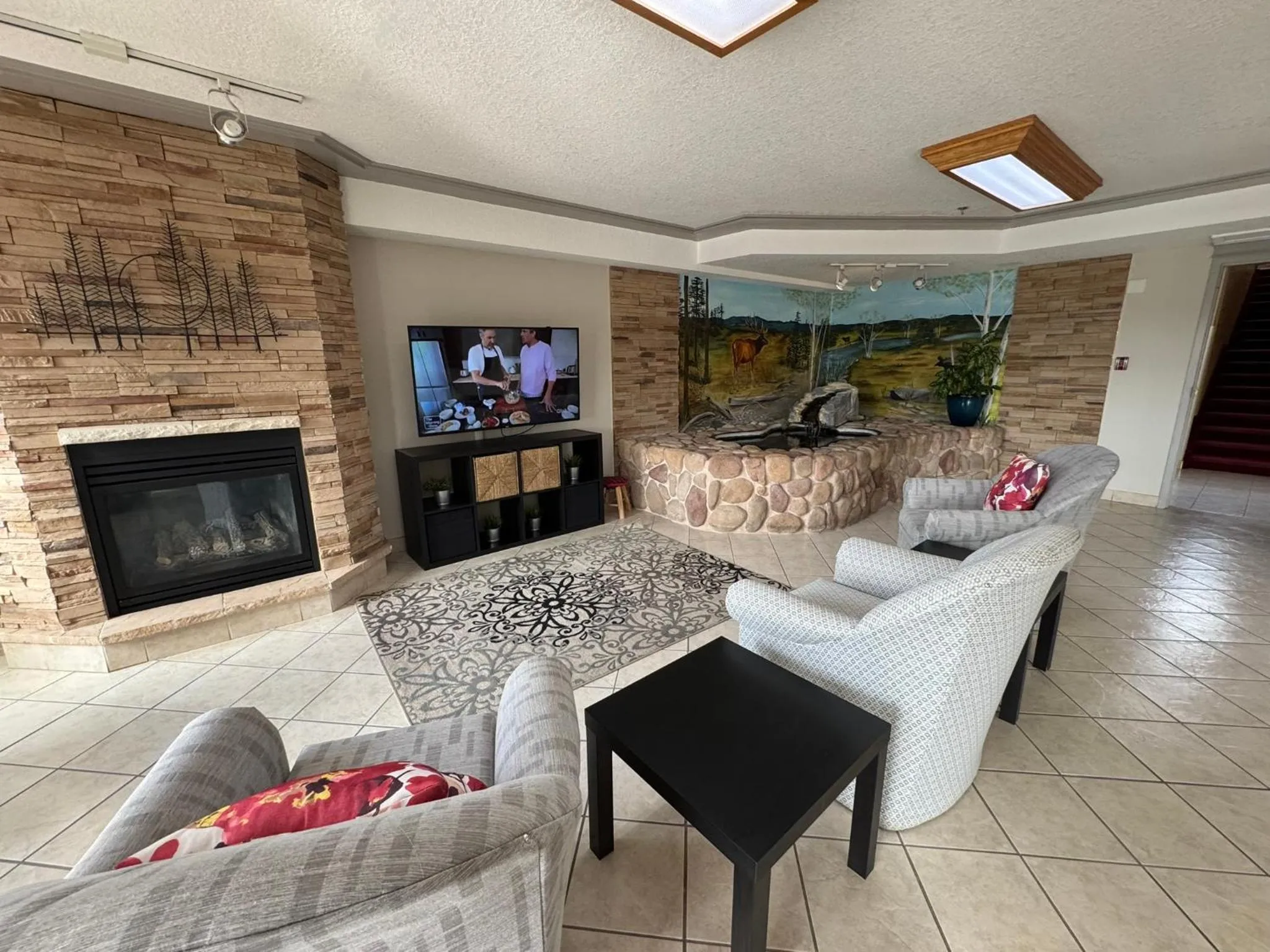 Communal lounge/ TV room in Western Budget Motel #3 Whitecourt