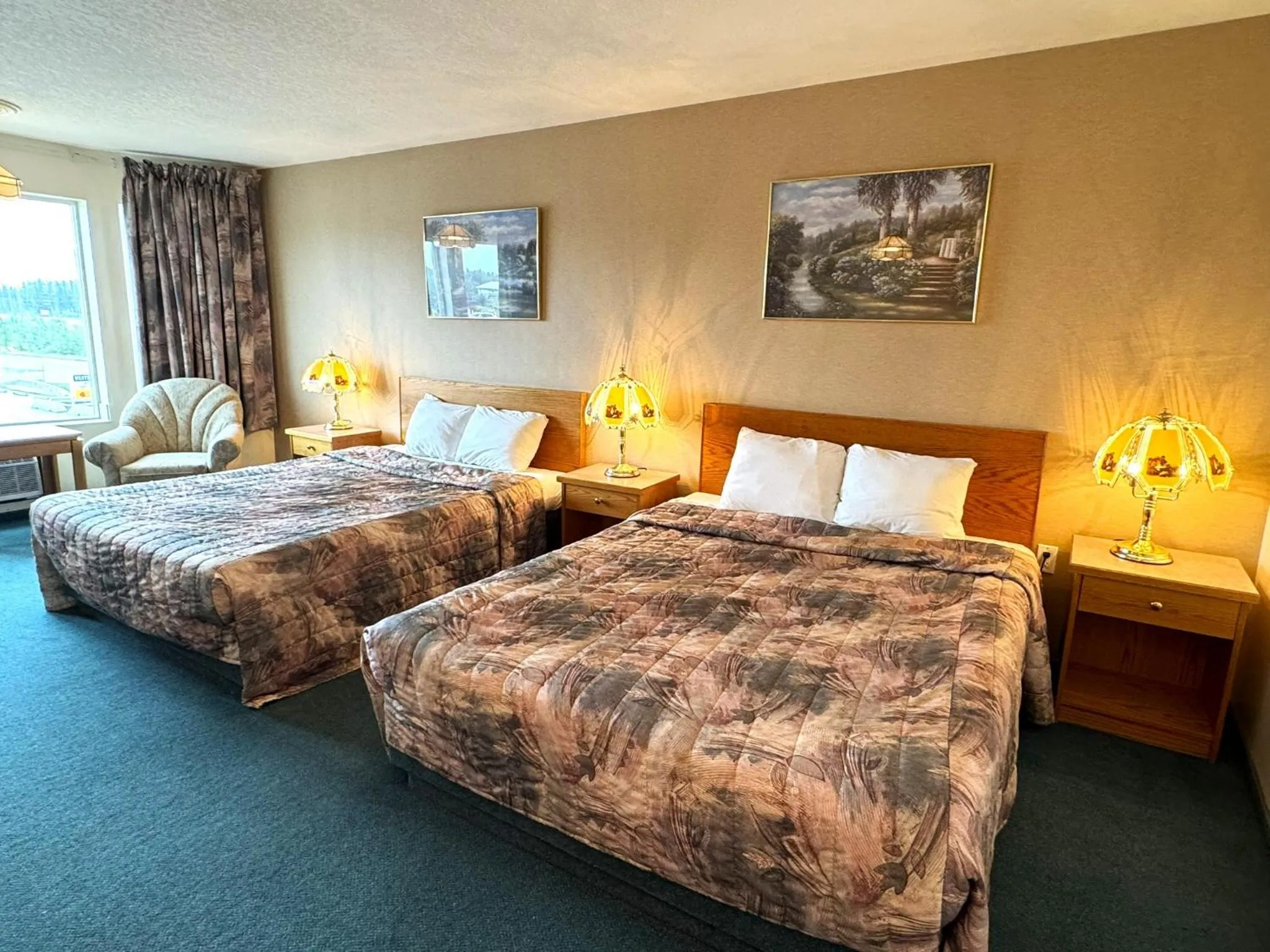 Bed in Western Budget Motel #3 Whitecourt