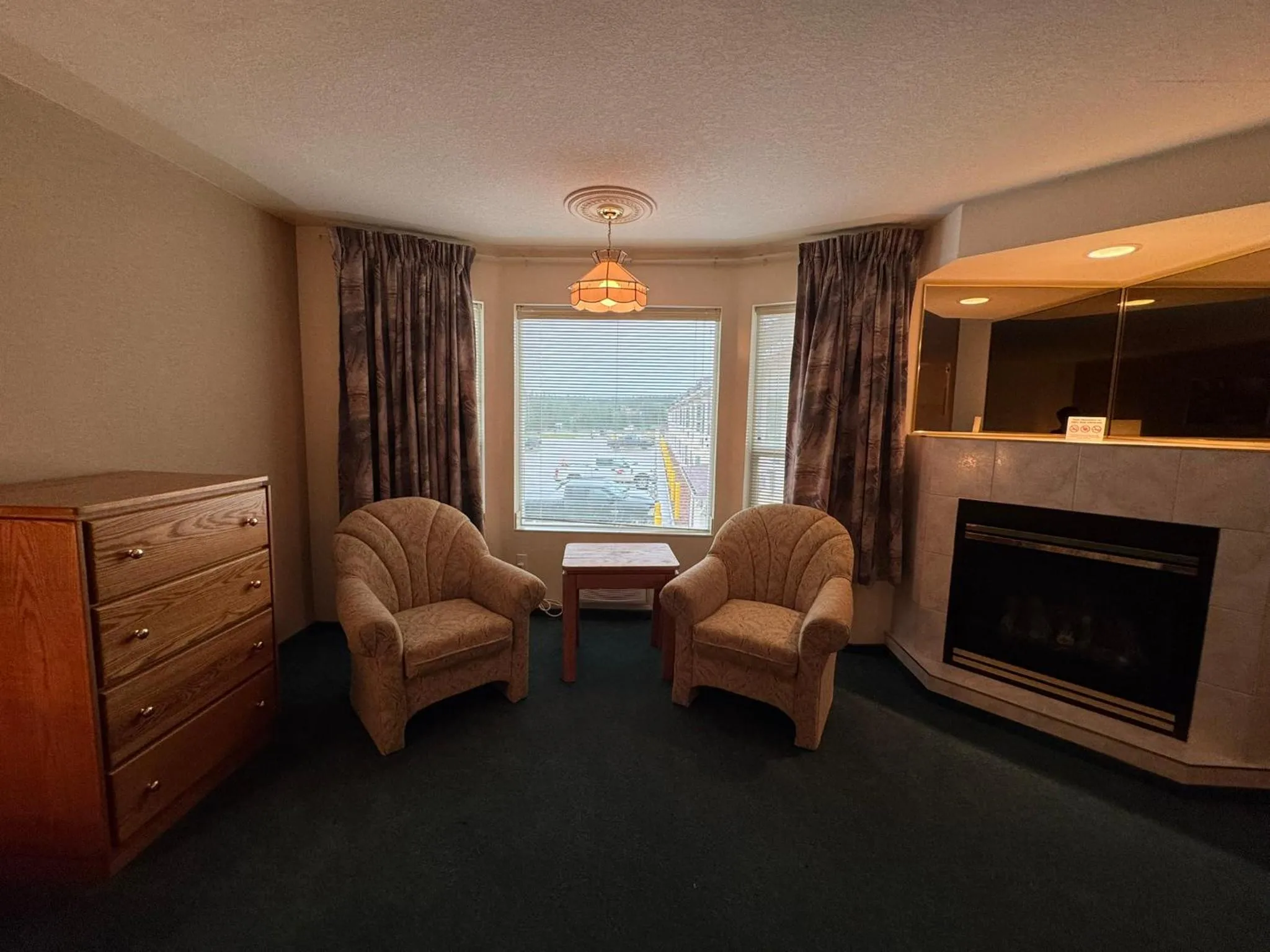 Seating area in Western Budget Motel #3 Whitecourt