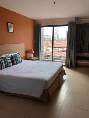 Bed in Vogue Pattaya Hotel