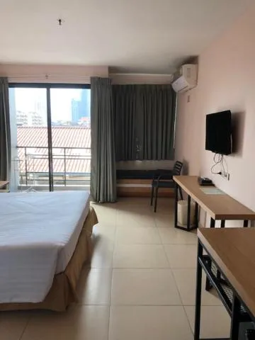 Bed in Vogue Pattaya Hotel