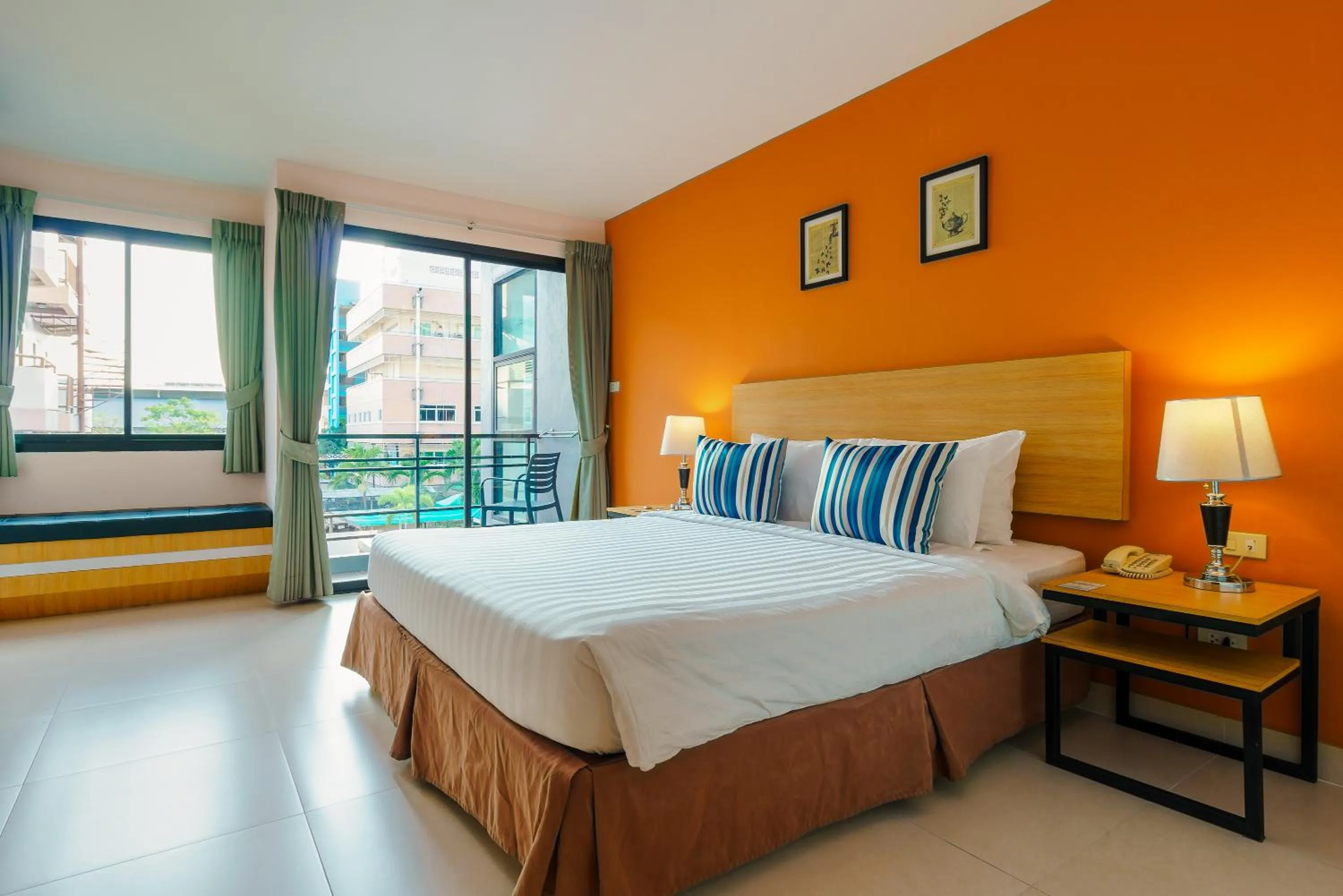 Bed in Vogue Pattaya Hotel