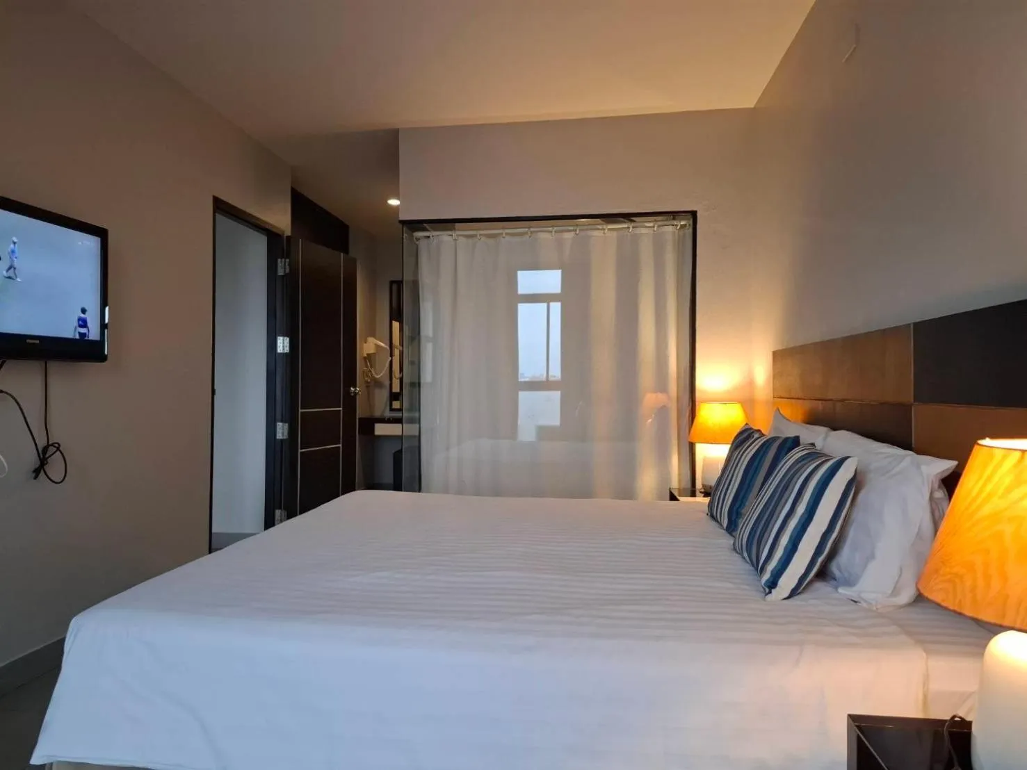 Bed in Vogue Pattaya Hotel