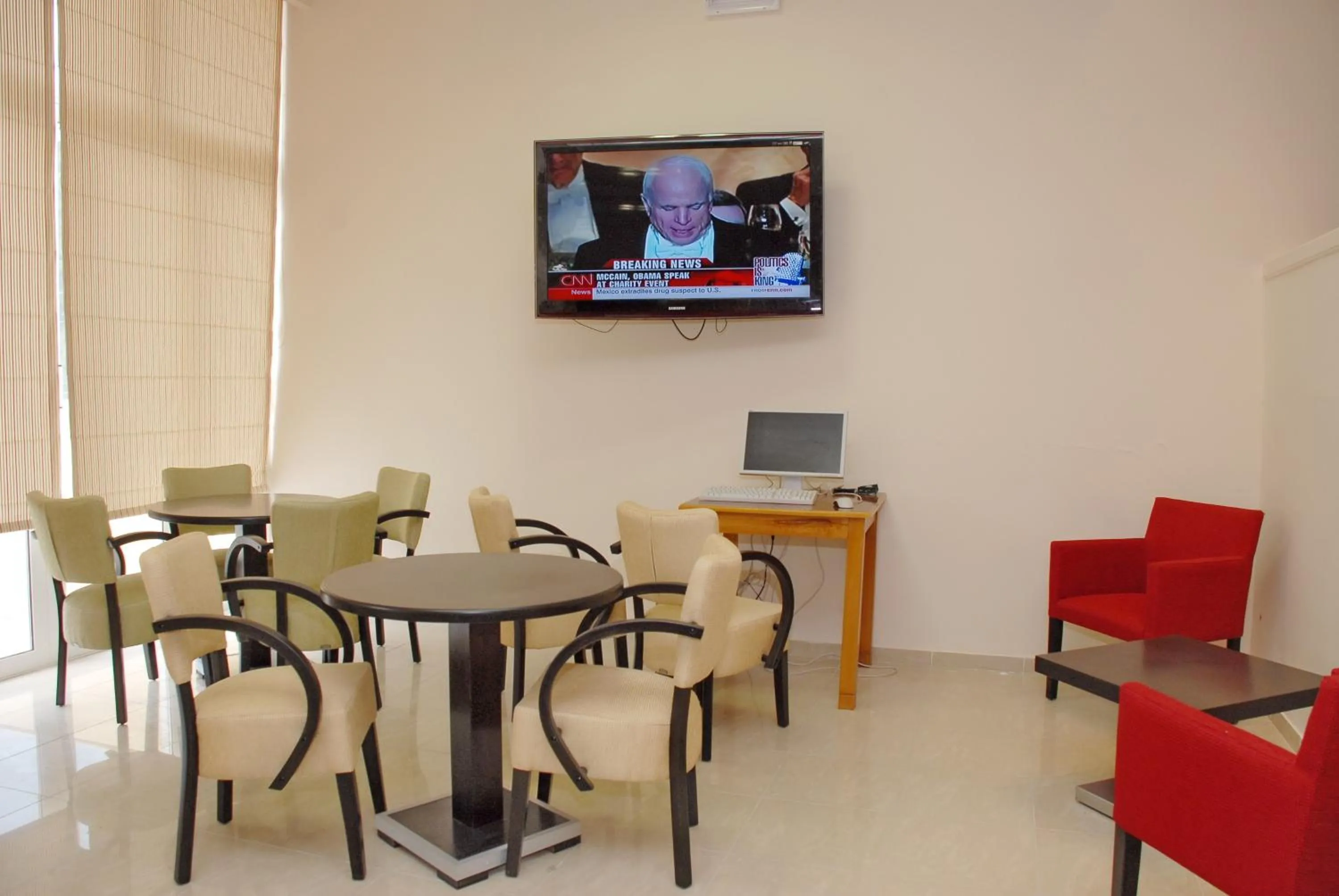 Communal lounge/ TV room in Glyfada Beach Hotel