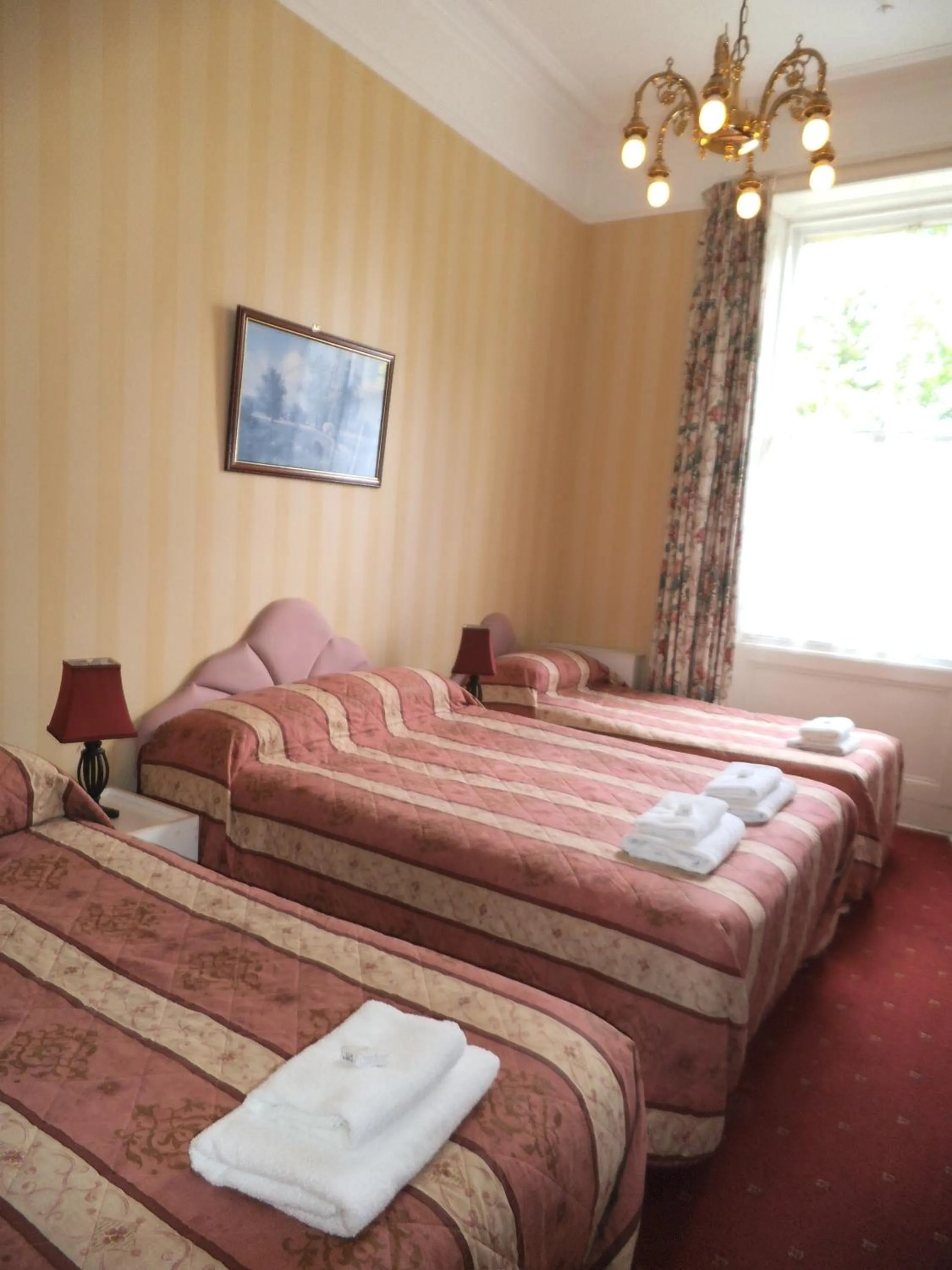 Bed in Menzies Guest House