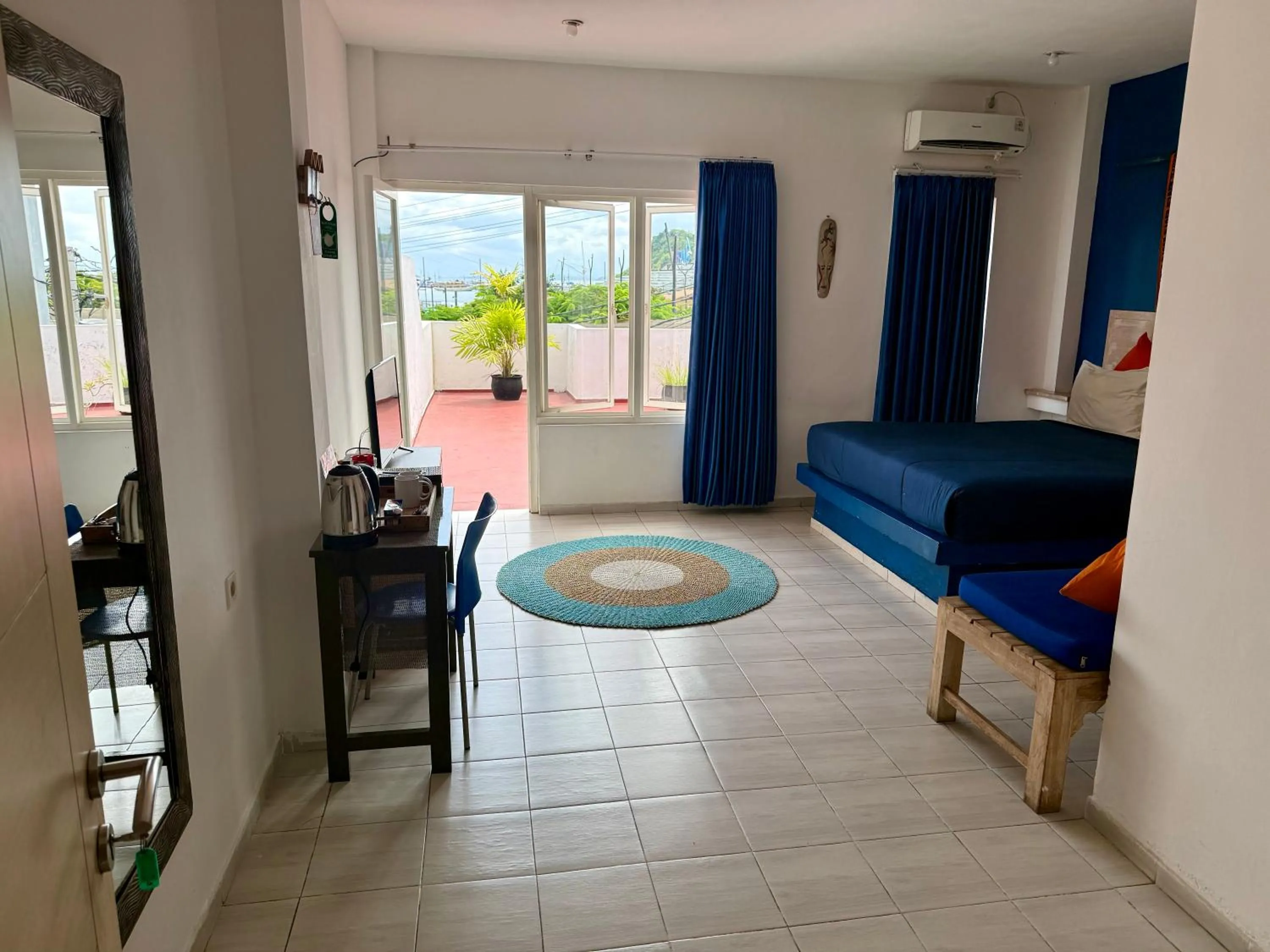 Bed in Blue Ocean Hotel