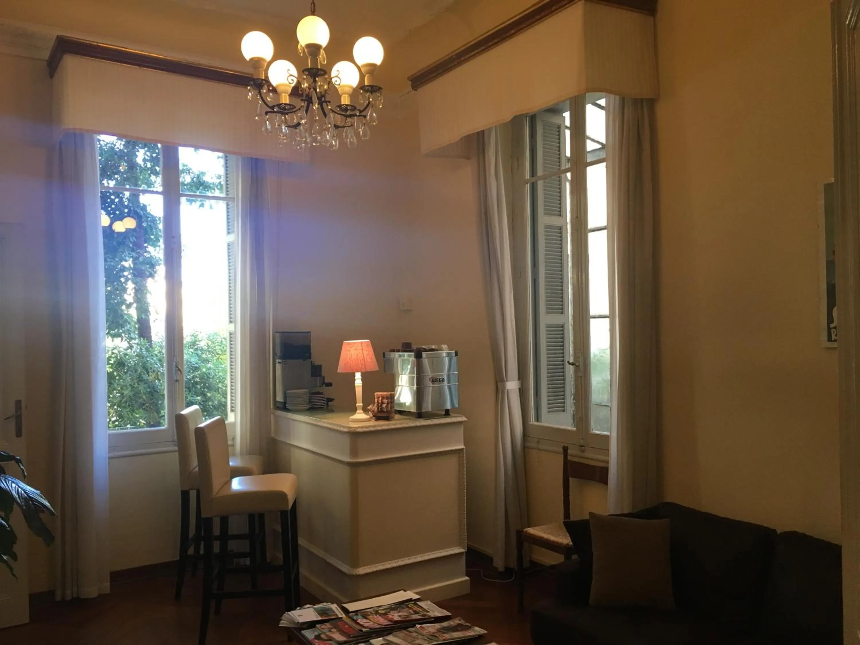 Communal lounge/ TV room in Hotel Liberty