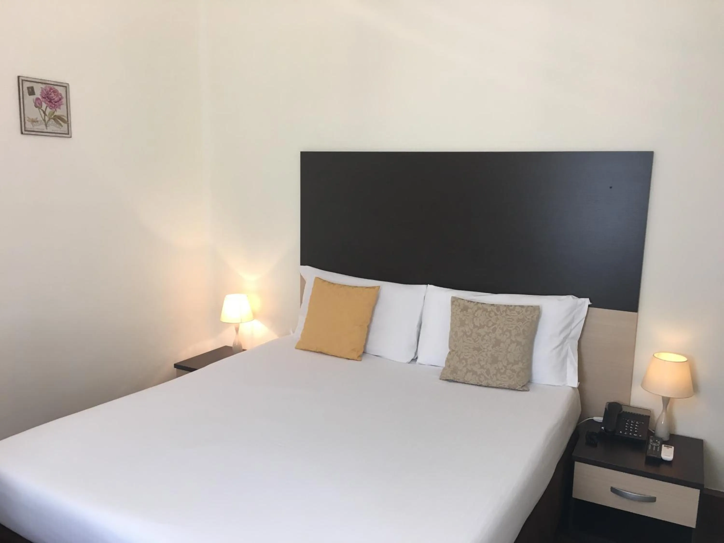 Bed in Hotel Liberty