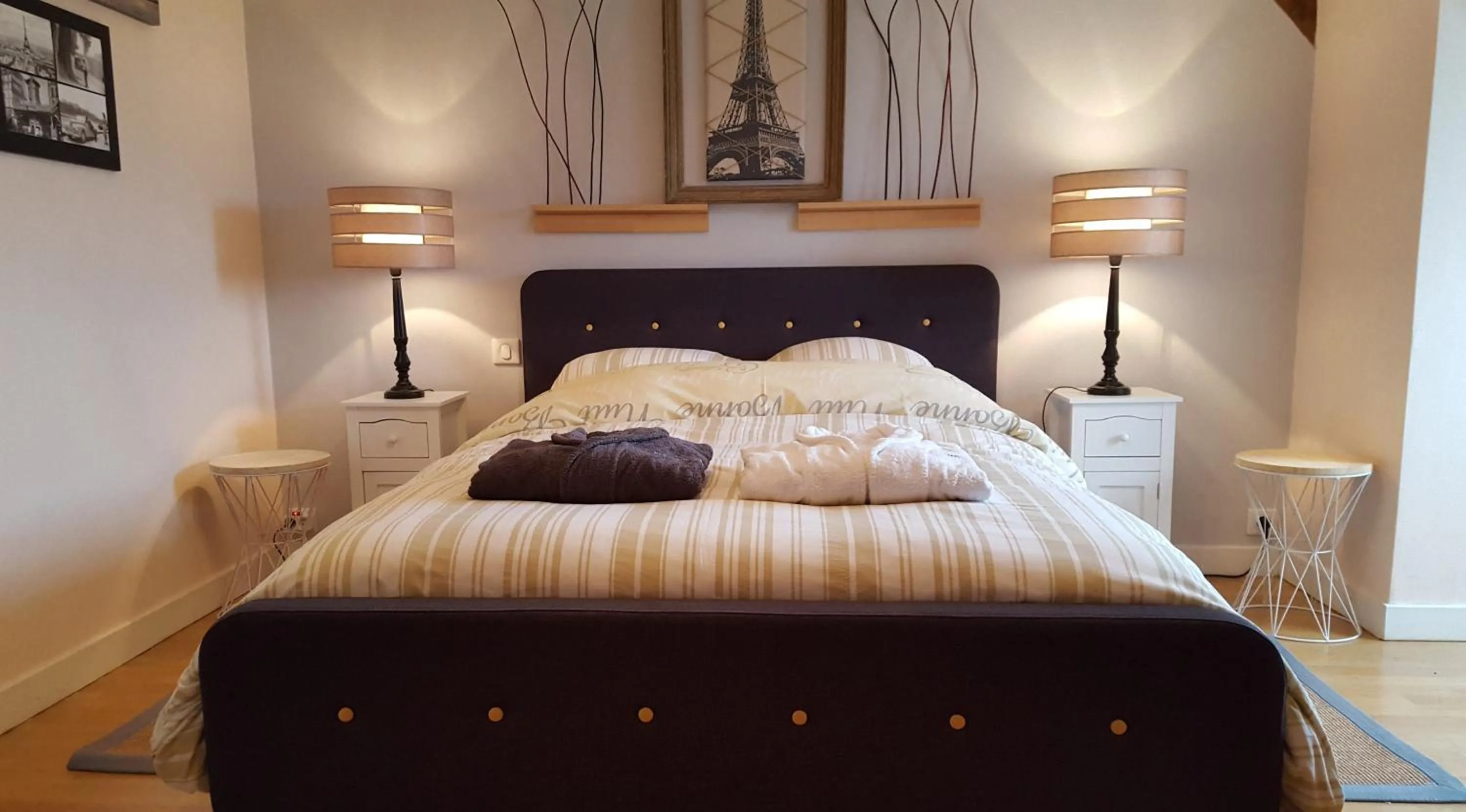 Bed in L'Horizon Holiday Apartment
