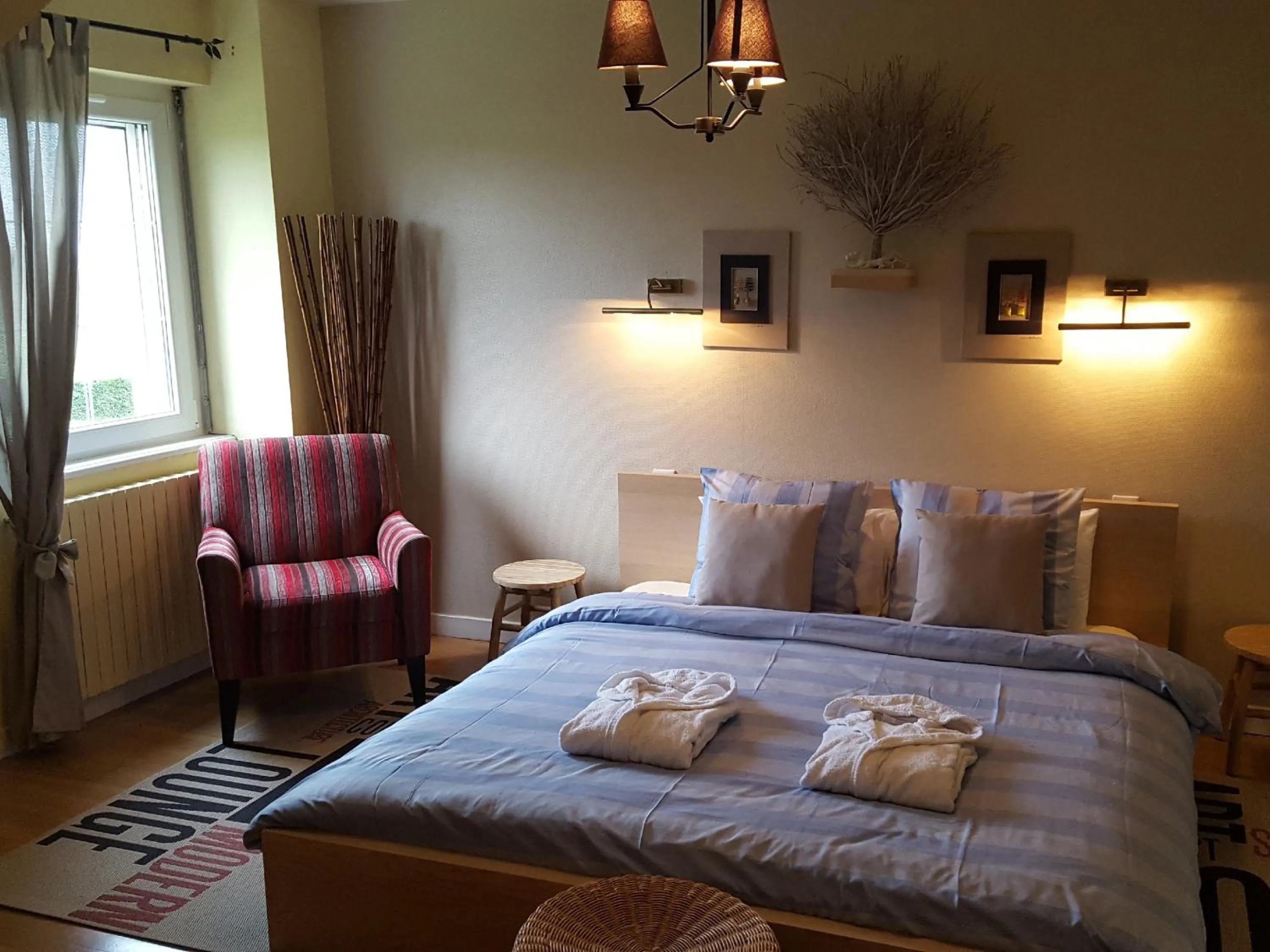Bed in L'Horizon Holiday Apartment