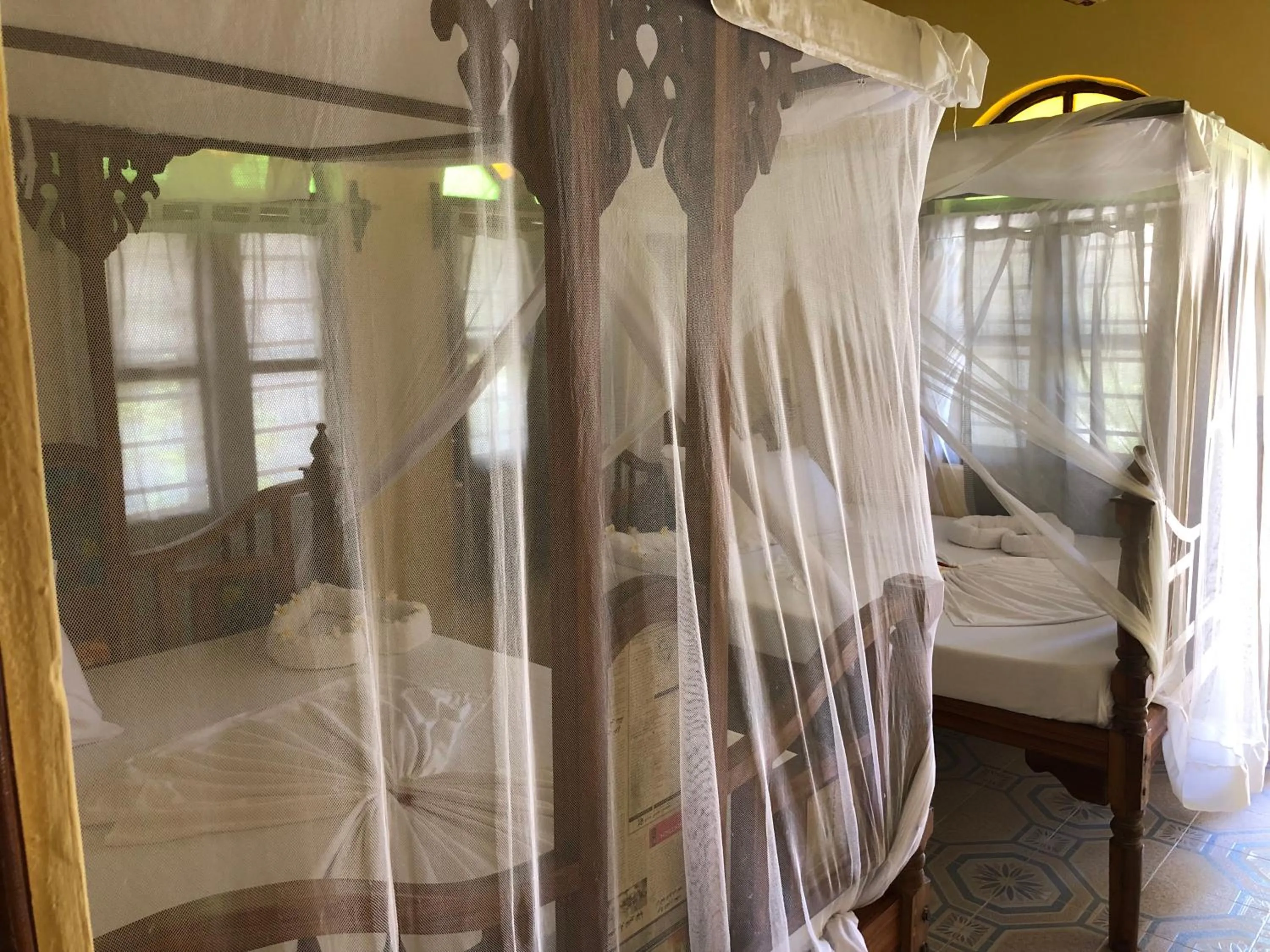 Bathroom, Bed in Blue Earth Beach Bungalow