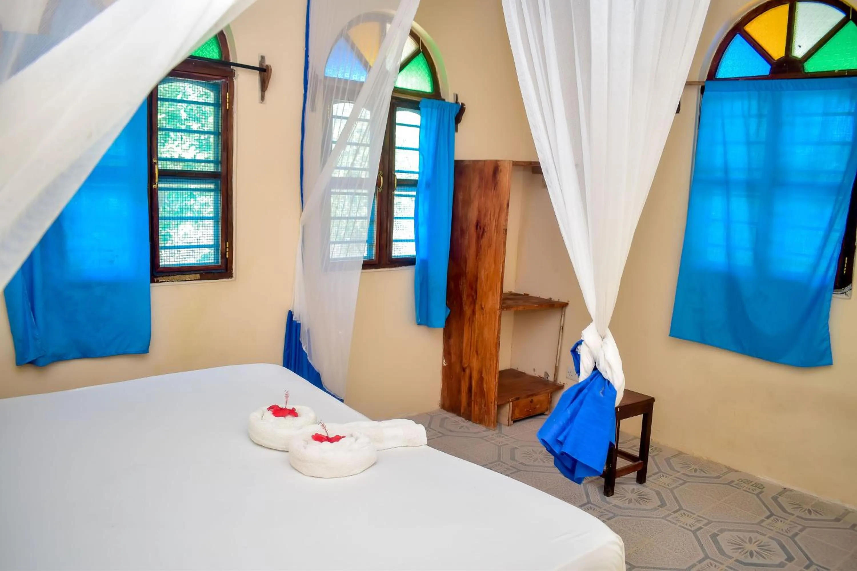 Bed in Blue Earth Beach Bungalow