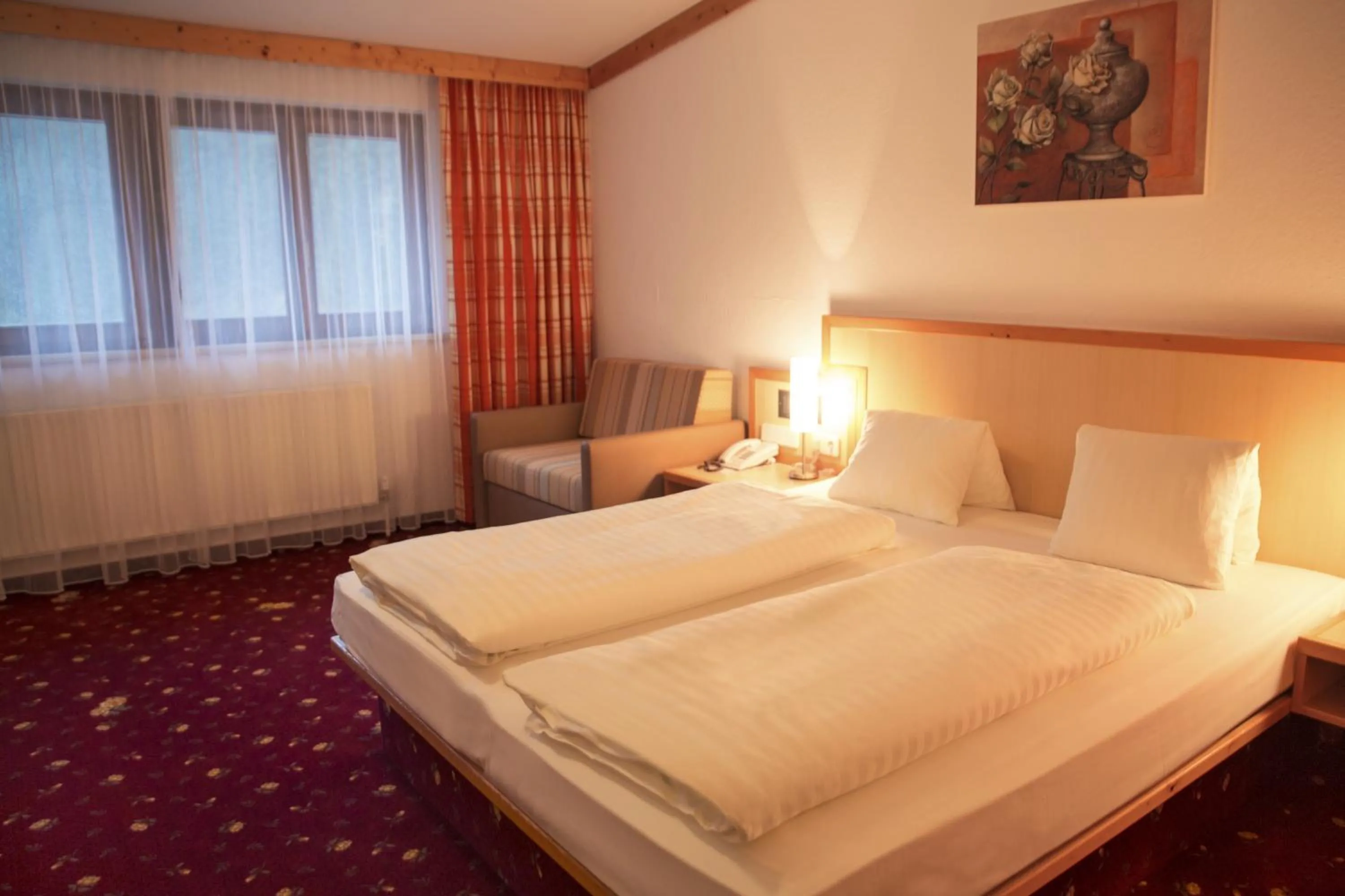 Bed in Alpensporthotel Mutterberg