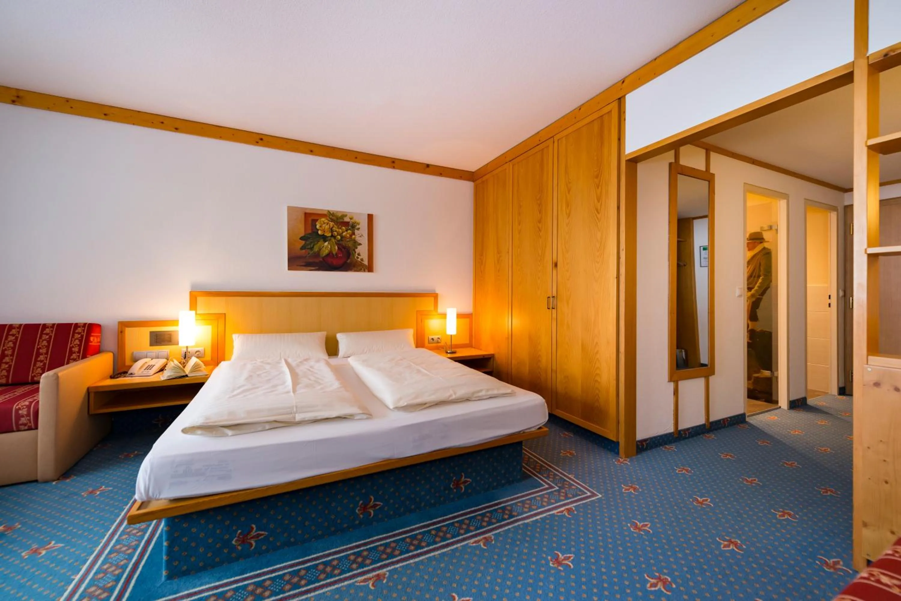 Photo of the whole room, Bed in Alpensporthotel Mutterberg