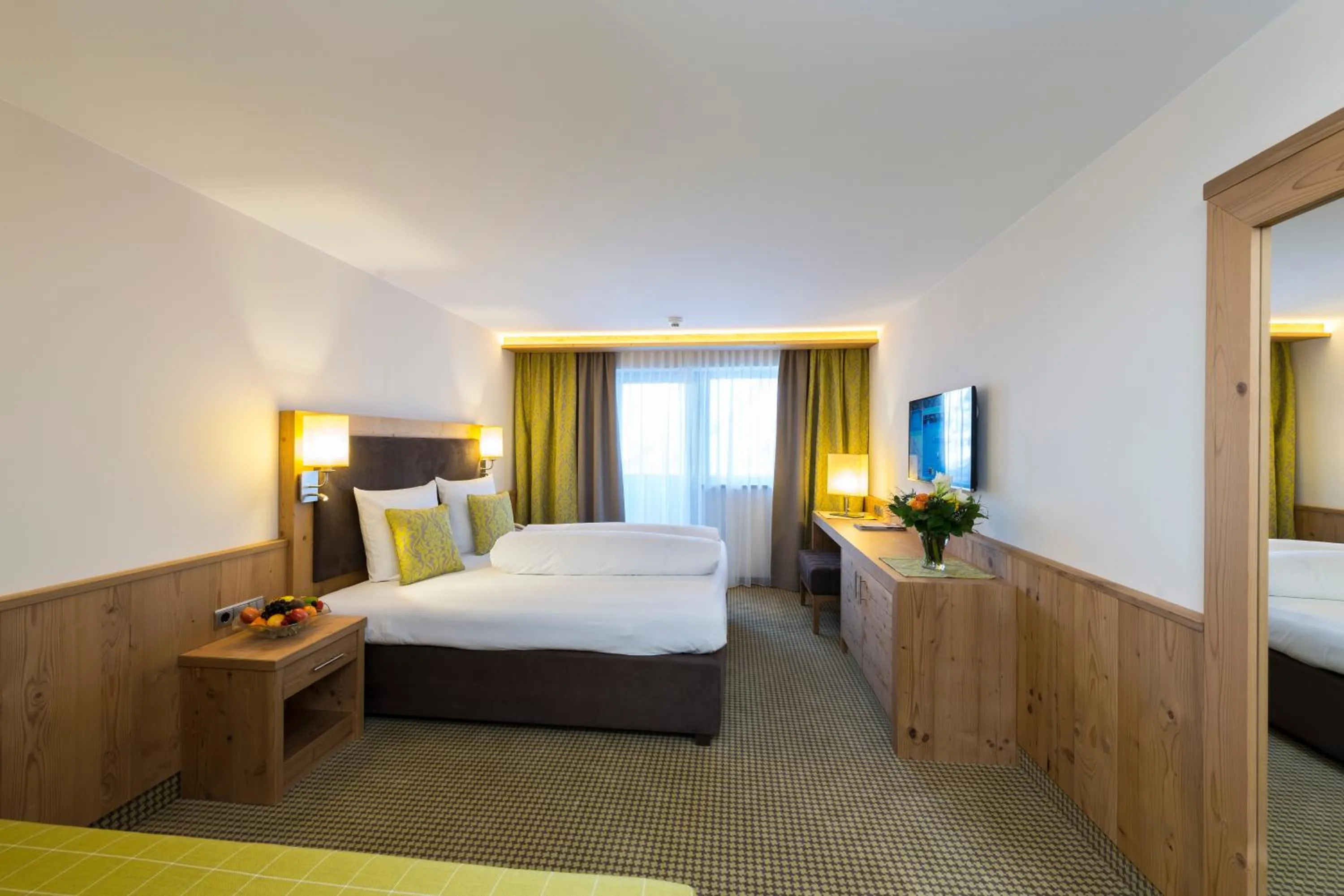 Photo of the whole room, Bed in Alpensporthotel Mutterberg