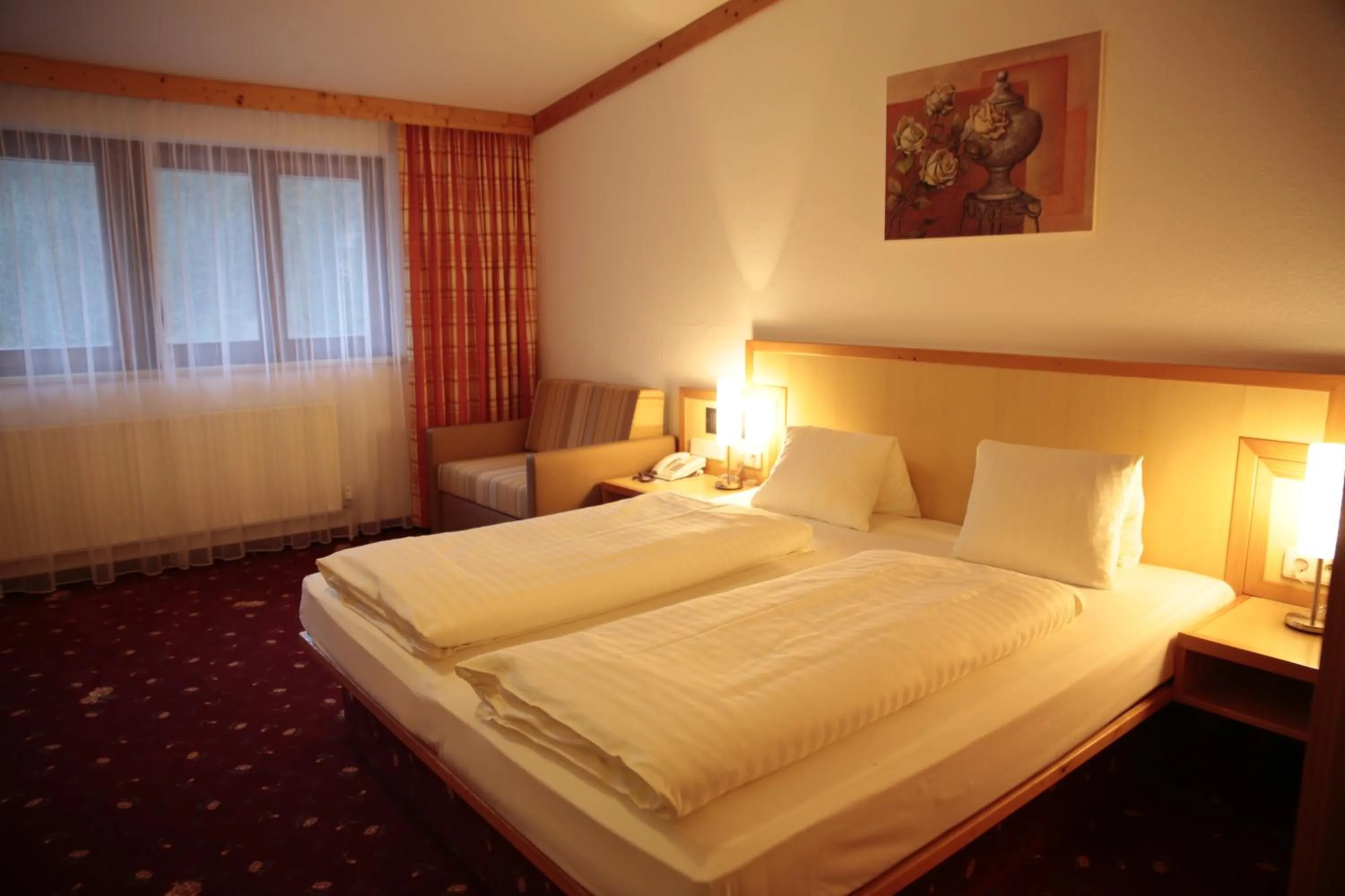 Bed in Alpensporthotel Mutterberg