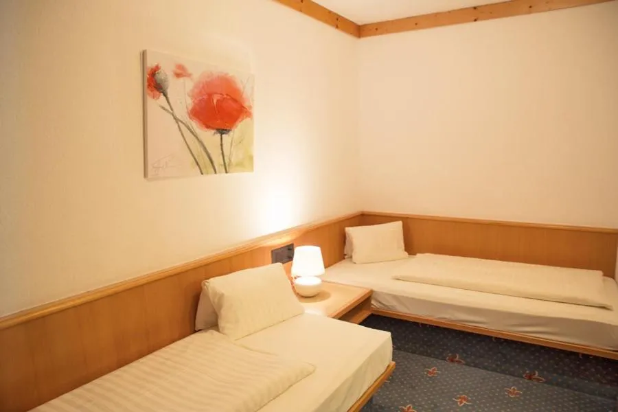 Bed in Alpensporthotel Mutterberg