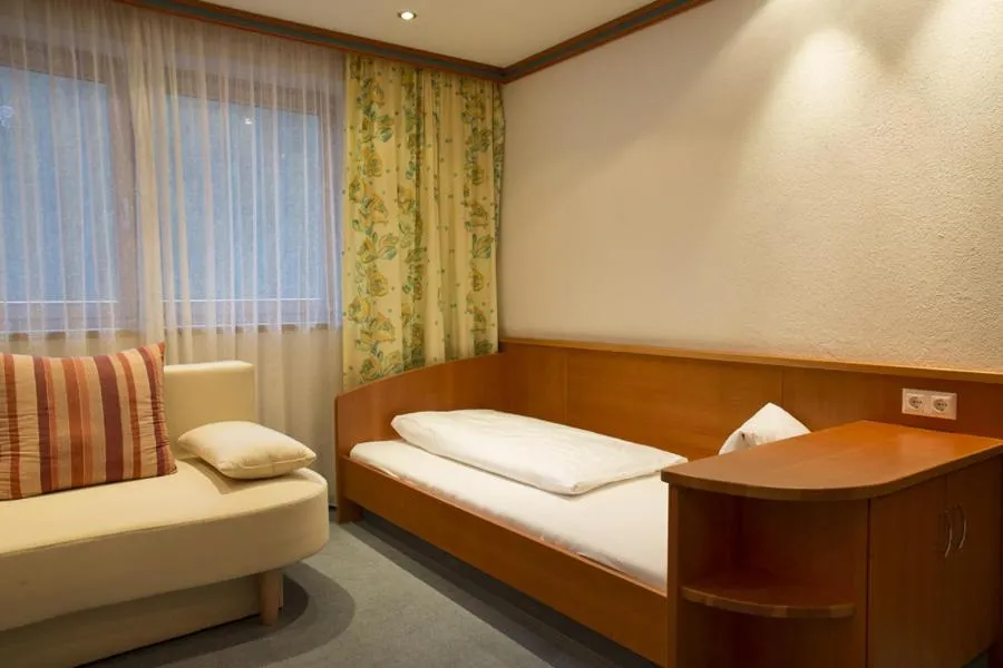 Bed in Alpensporthotel Mutterberg