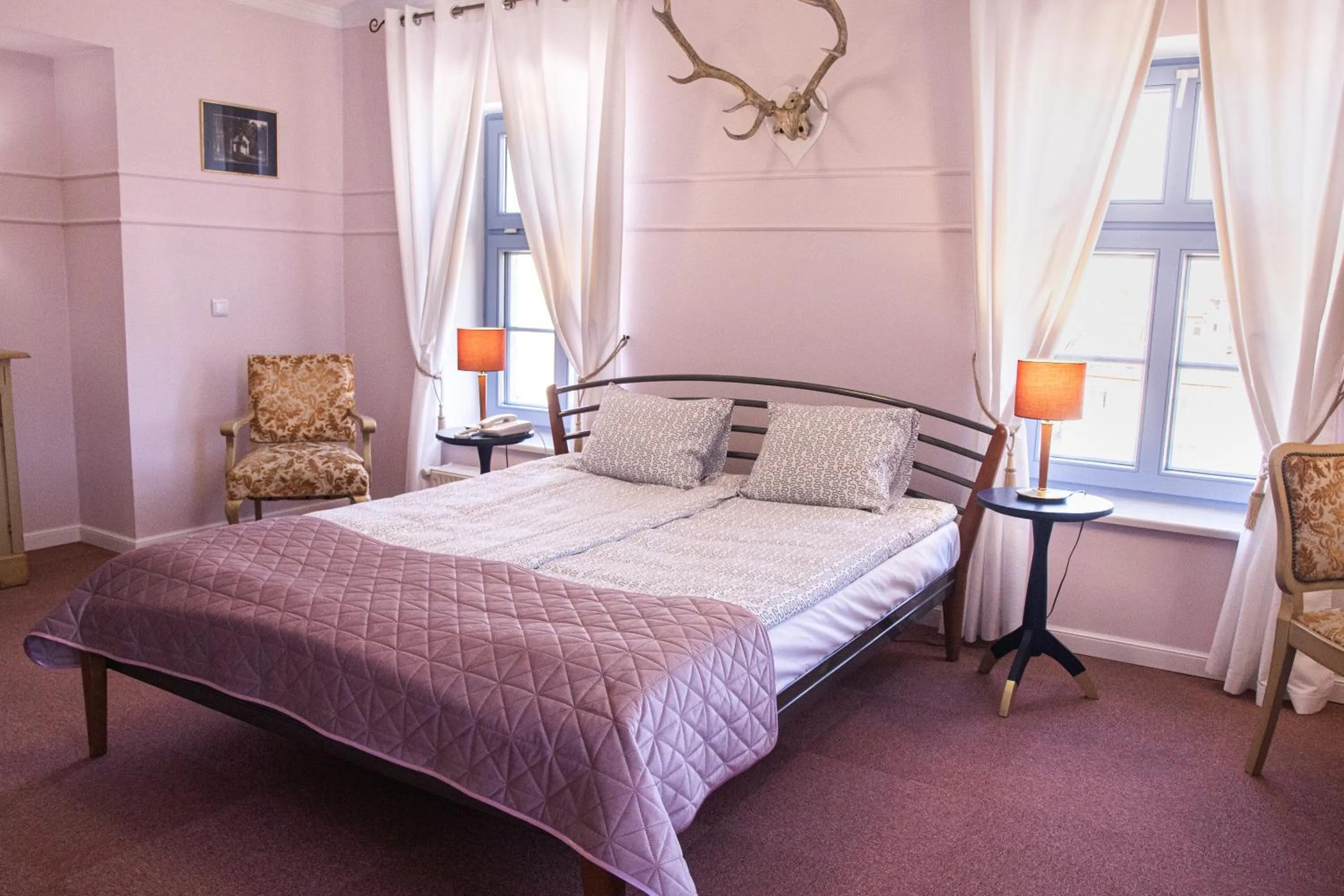 Bed in Hotel Marmułowski