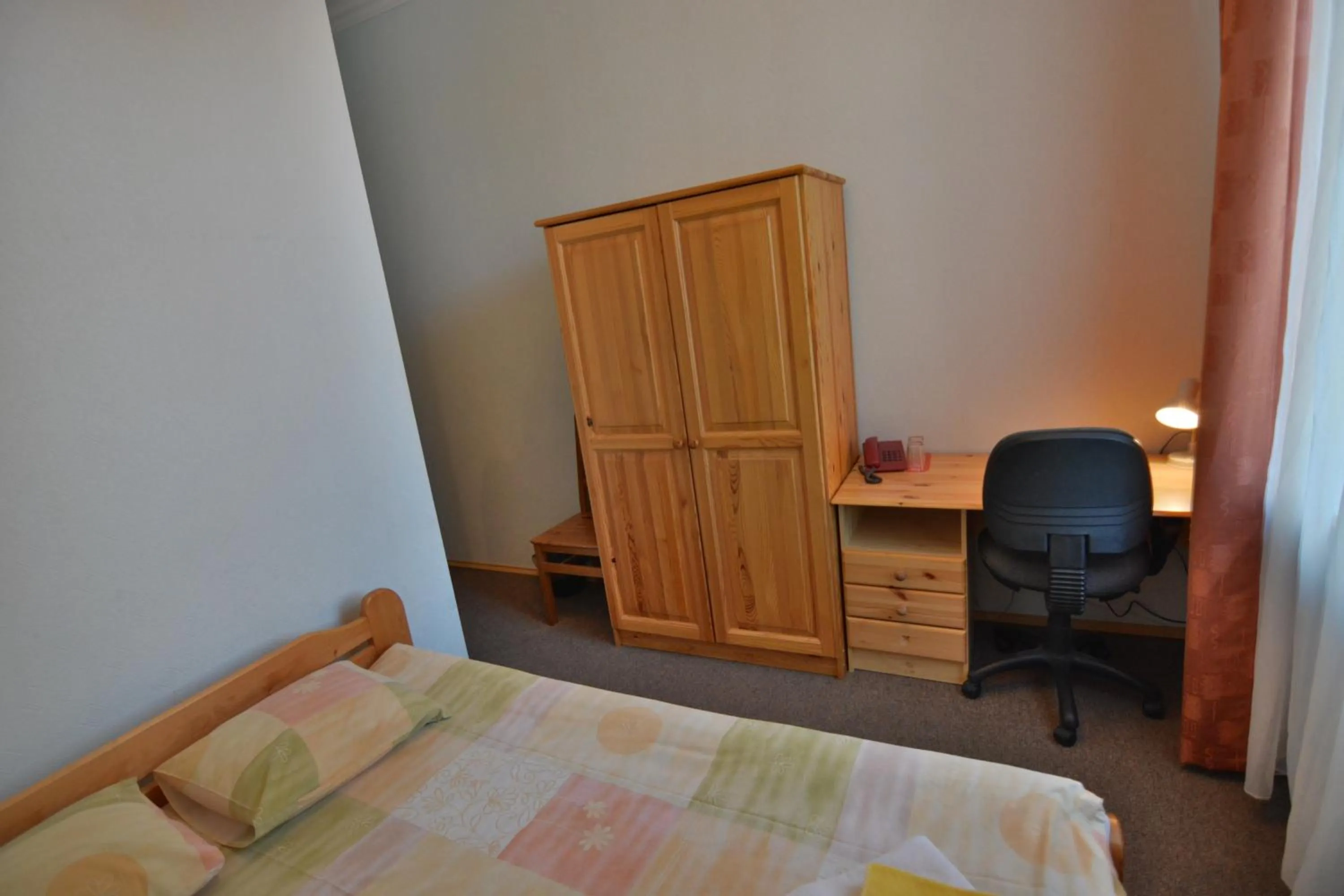 Photo of the whole room, Bed in Hotel Multilux with Self Check-in