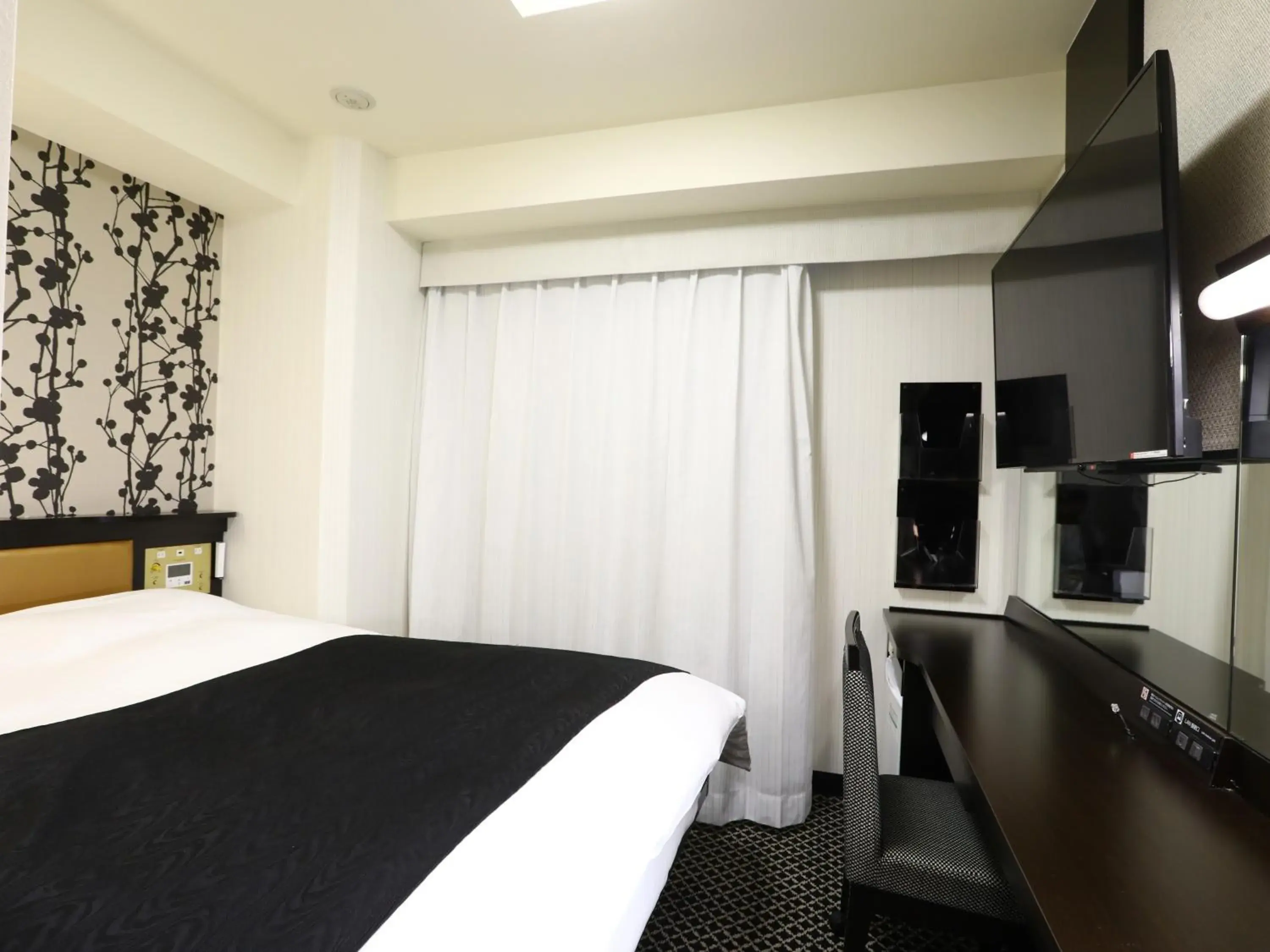 Bed in APA Hotel Iidabashi Ekiminami Bed in APA Hotel Iidabashi Ekiminami