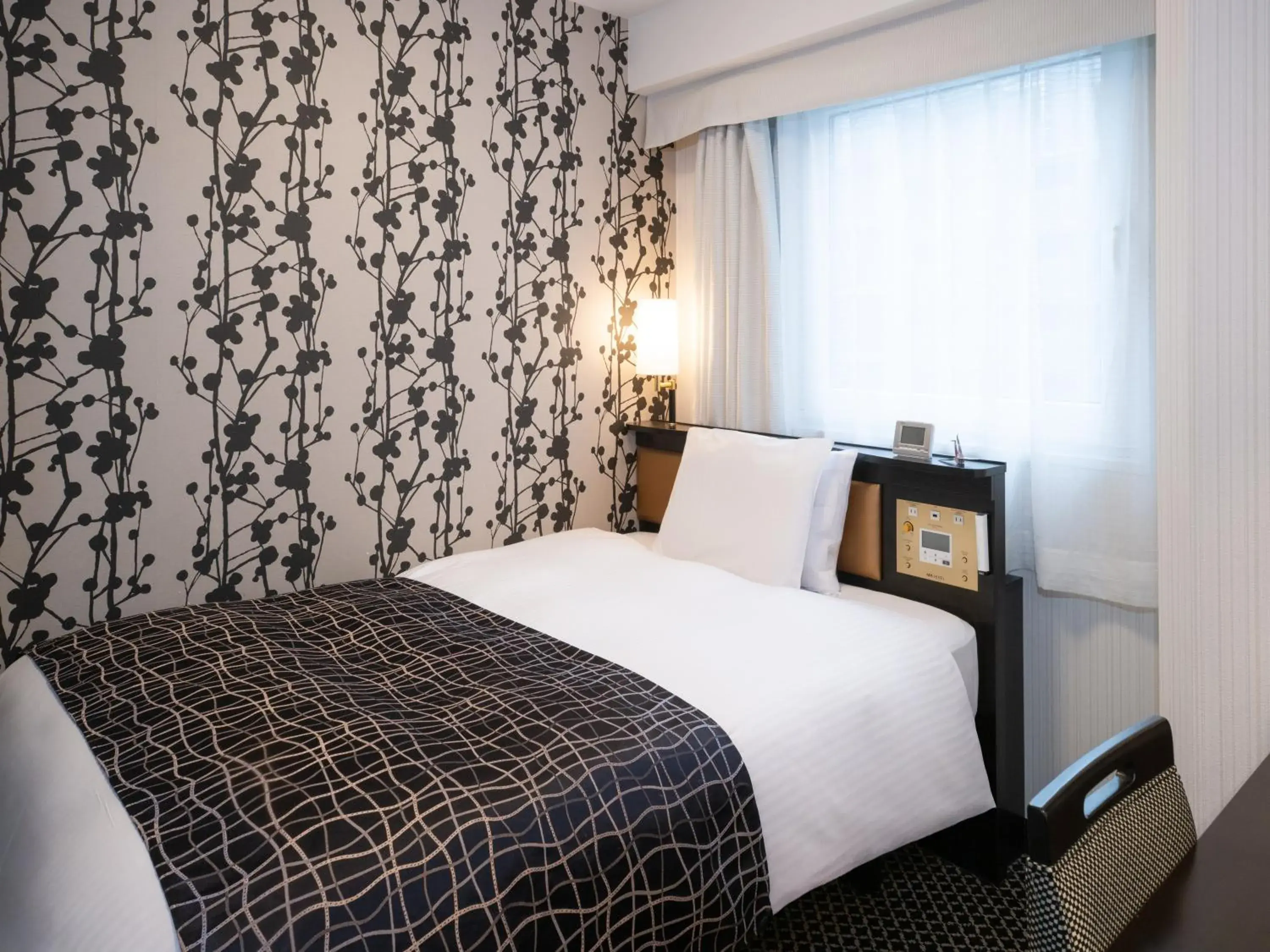 Bed in APA Hotel Iidabashi Ekiminami Bed in APA Hotel Iidabashi Ekiminami