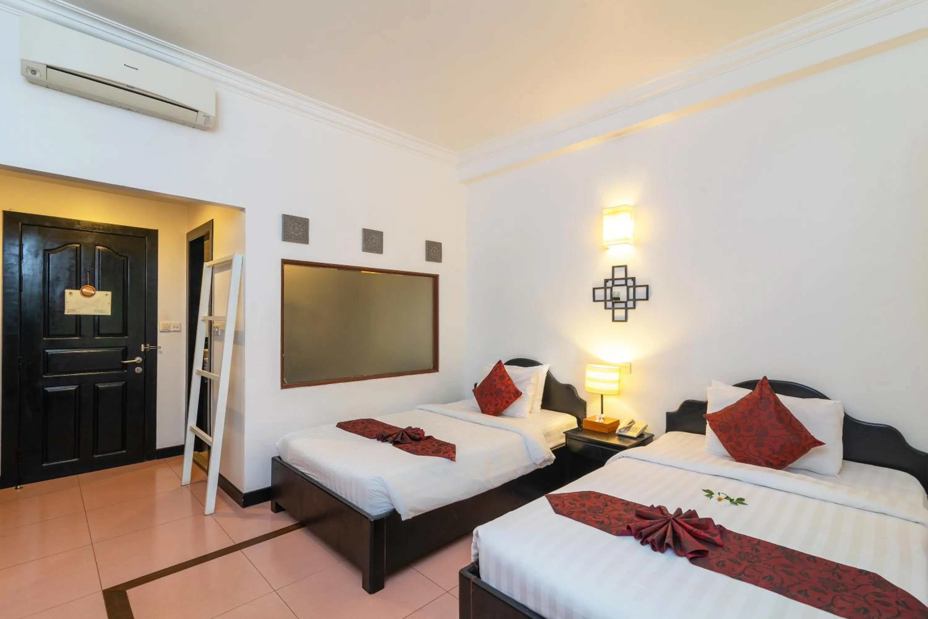 Bed in Amber Angkor Villa Hotel & Spa