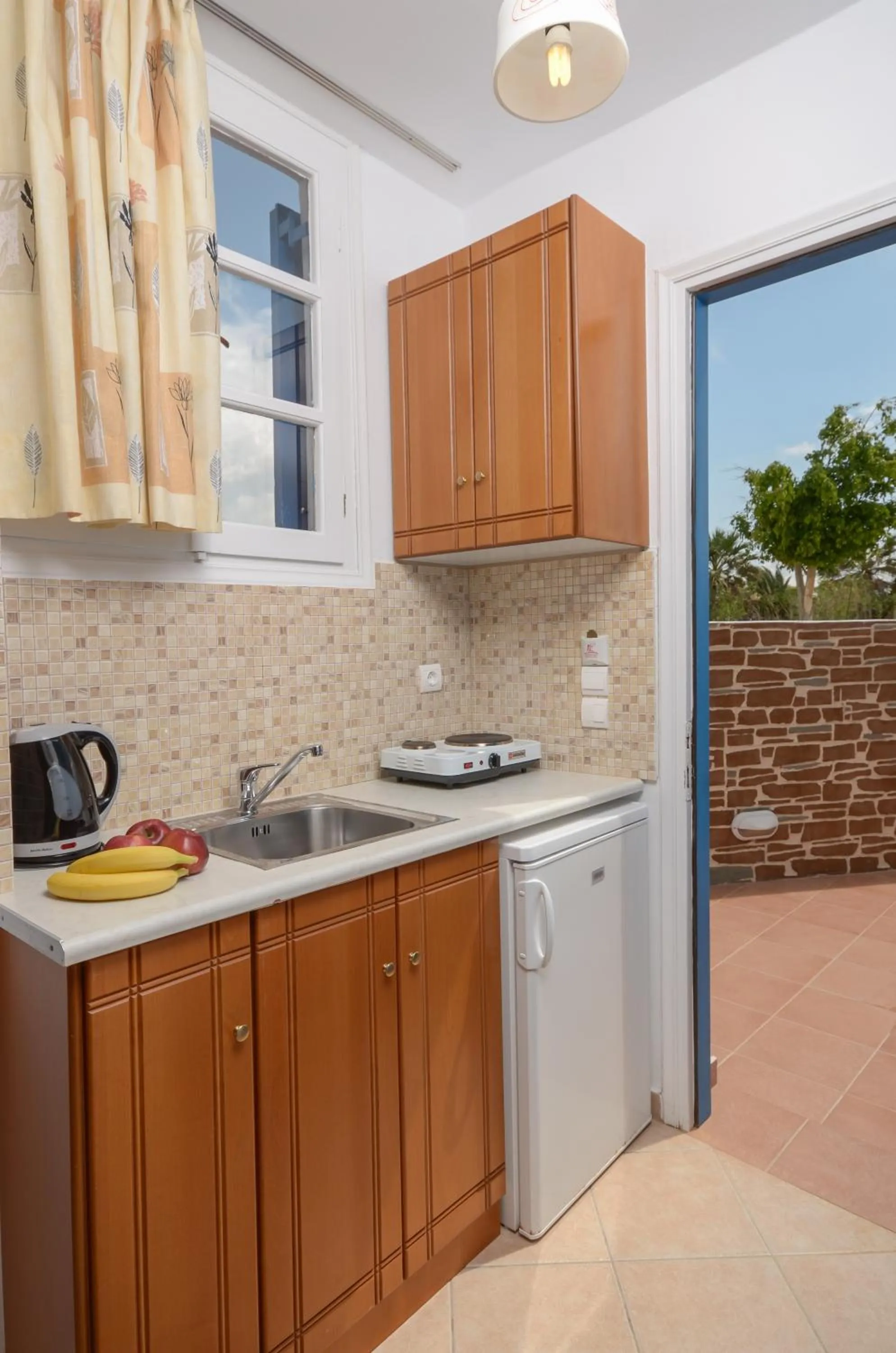 Kitchen or kitchenette in Sun Beach Hotel