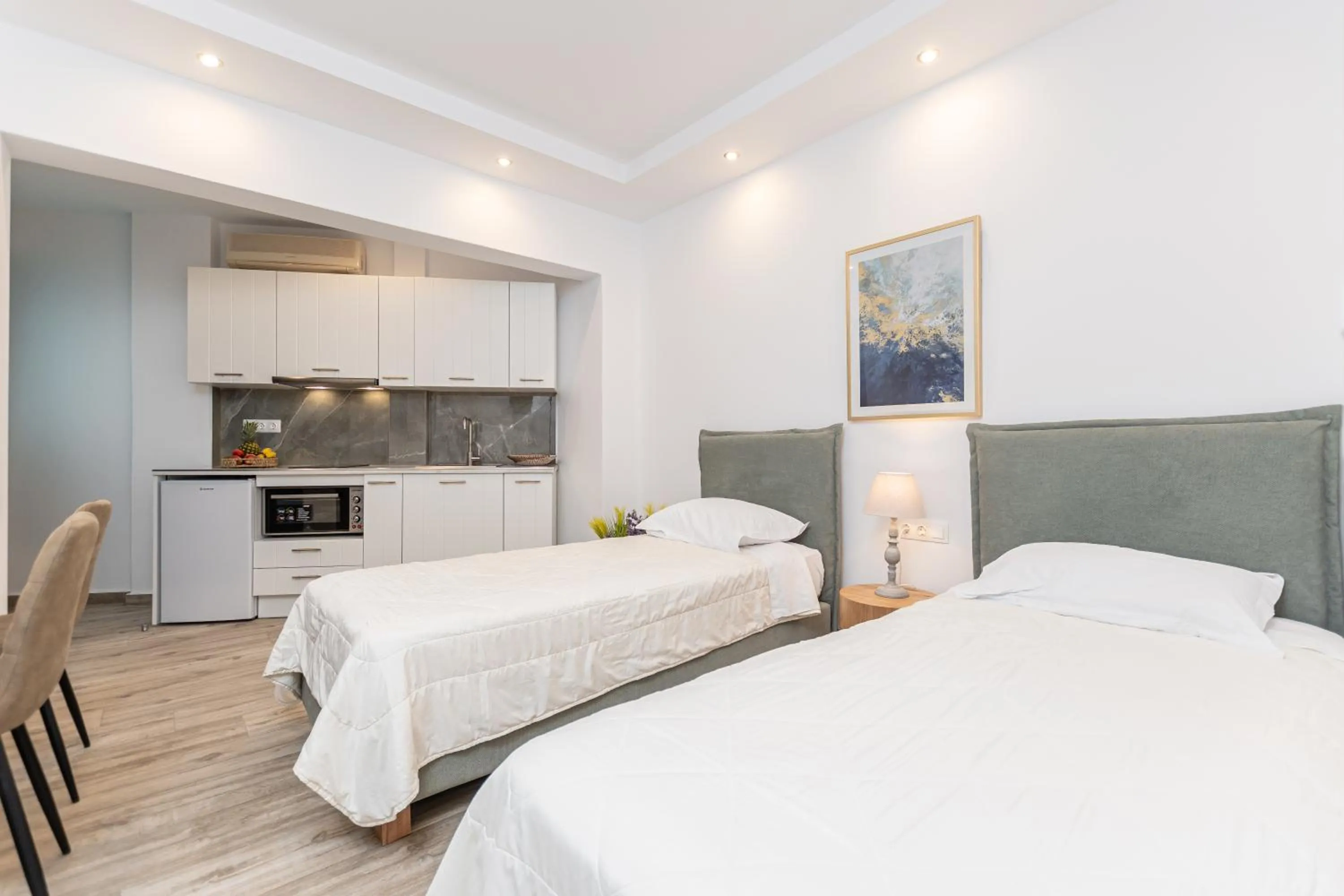 Kitchen or kitchenette, Bed in Sun Beach Hotel