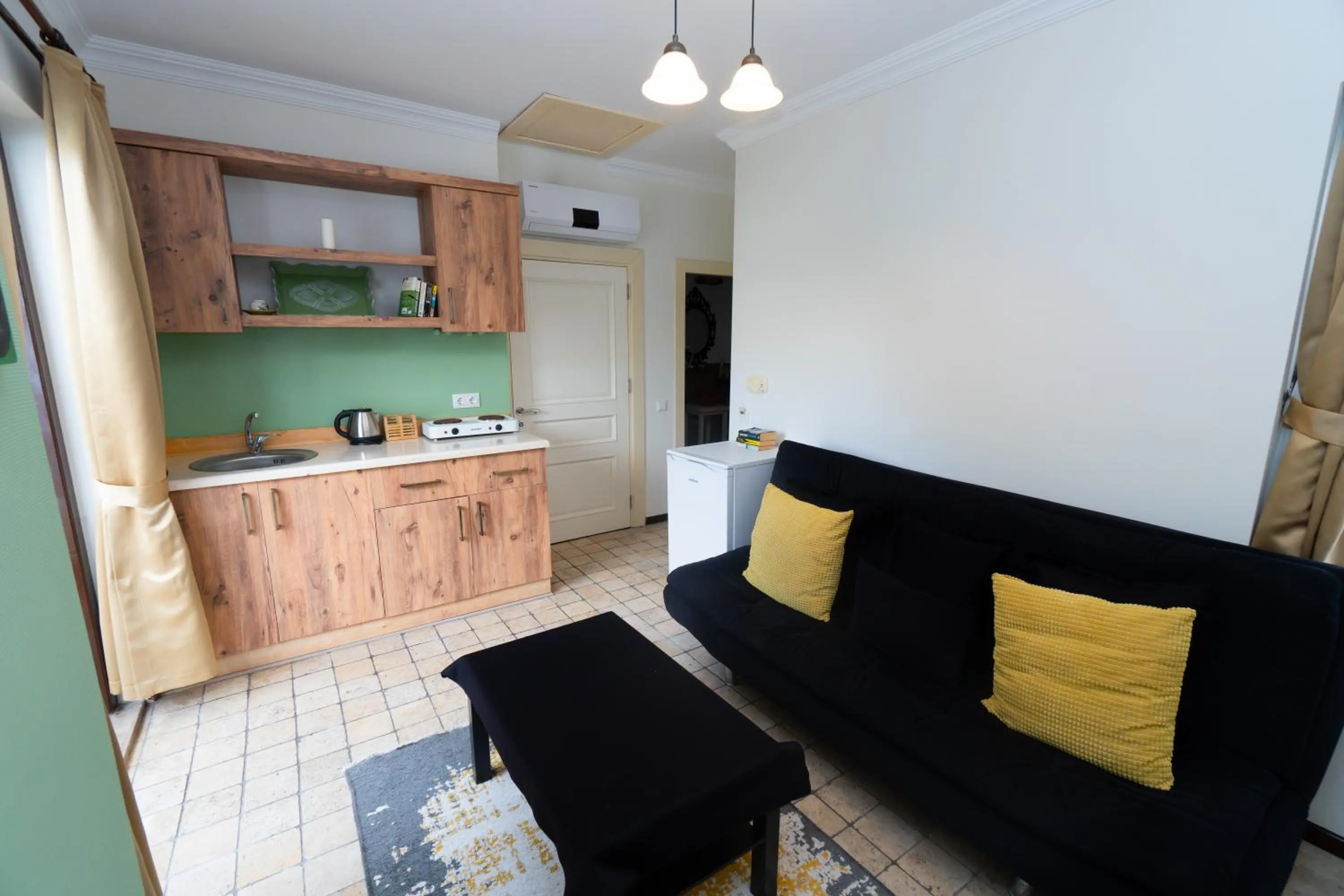 Kitchen or kitchenette in The Suite Apart Hotel