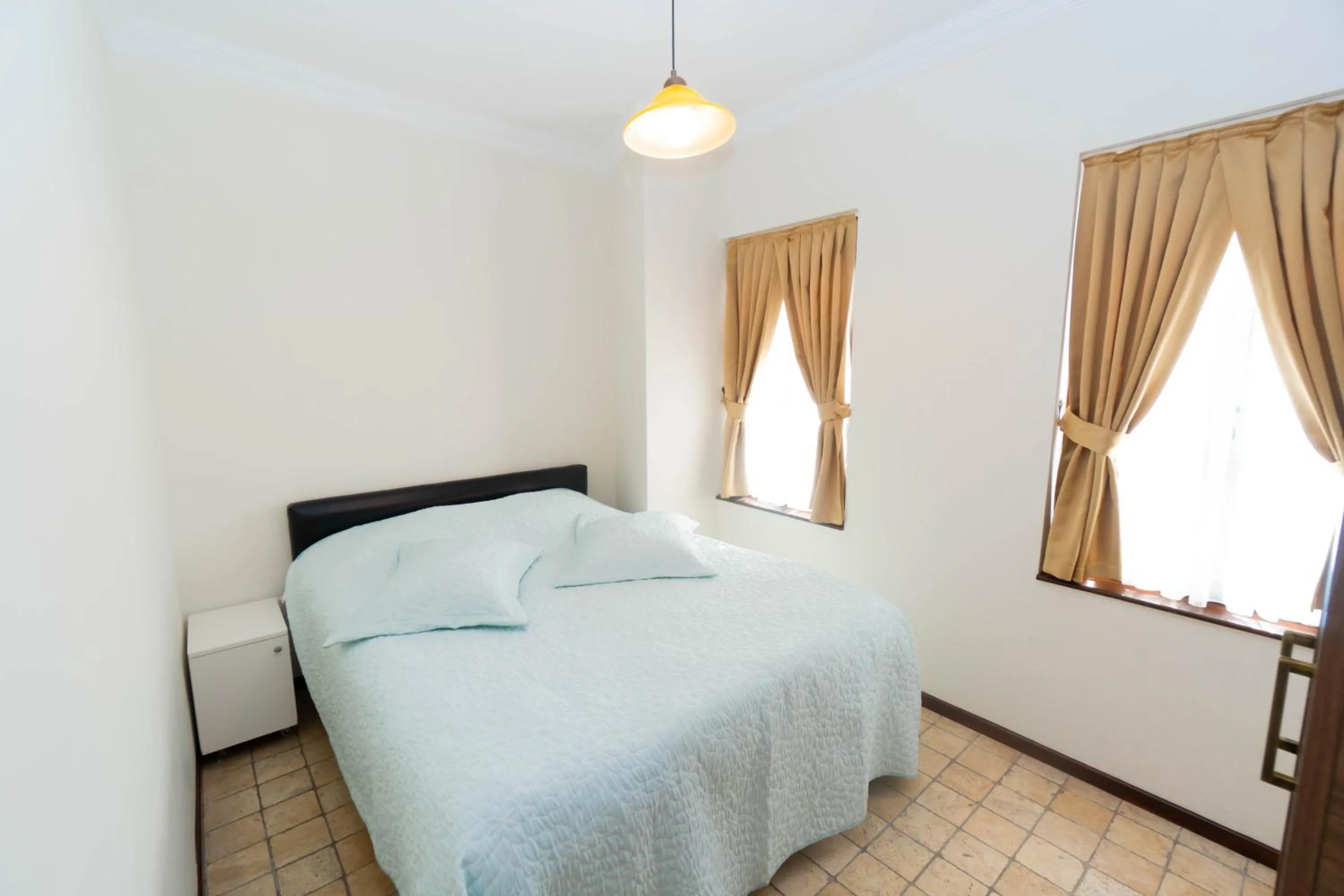 Bed in The Suite Apart Hotel