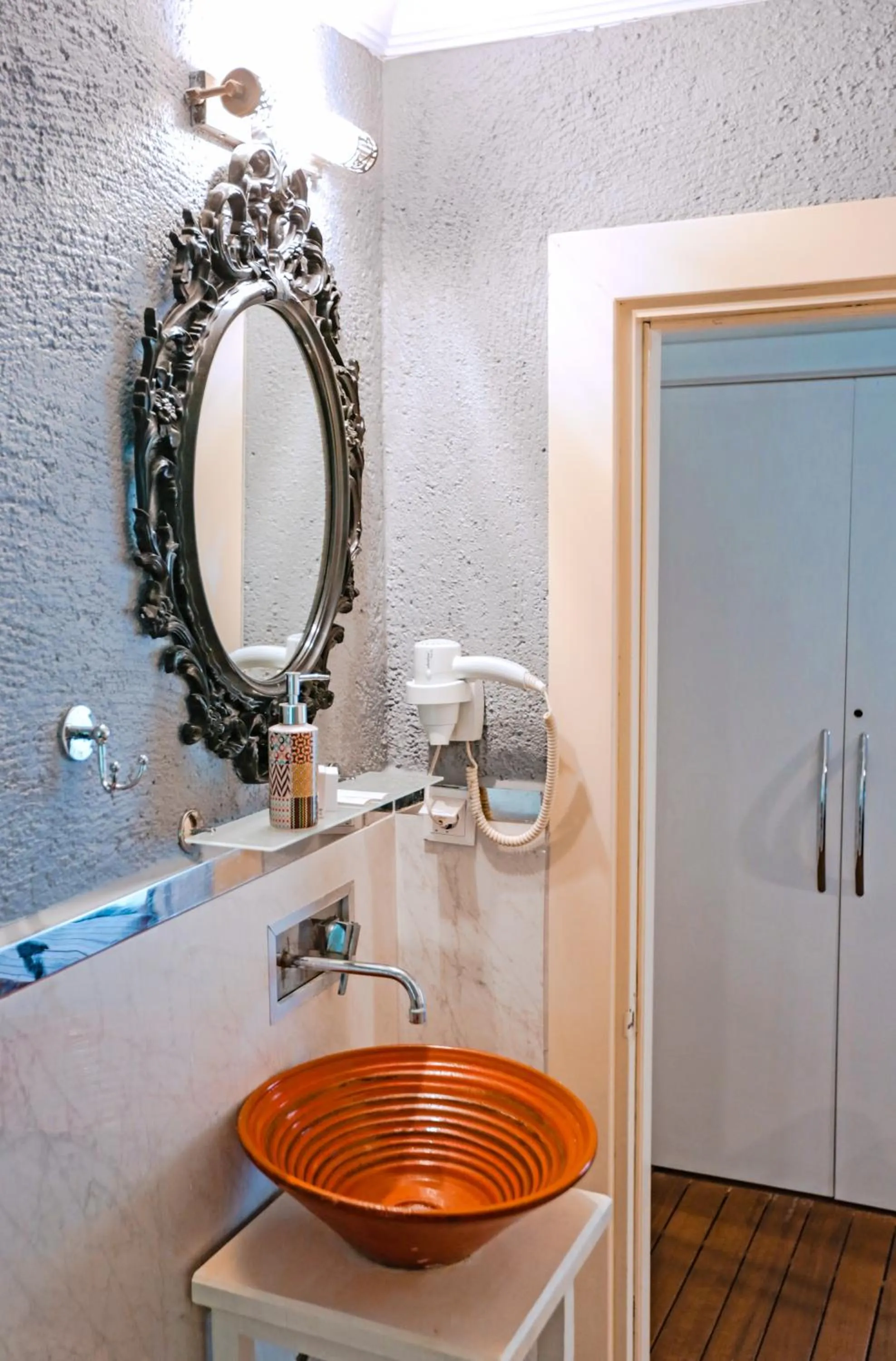 Toilet in The Suite Apart Hotel