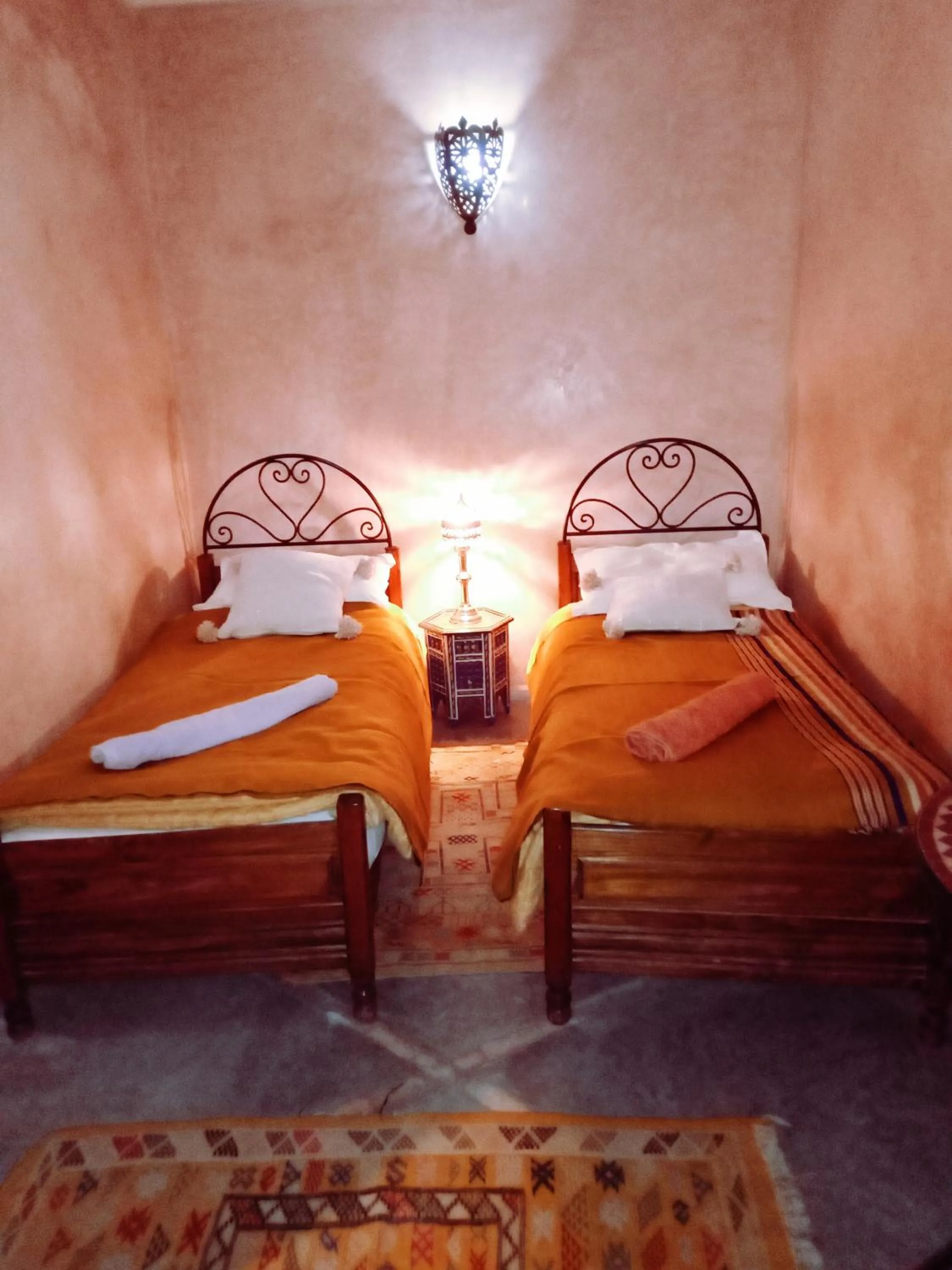 Bed in Riad Essaoussan